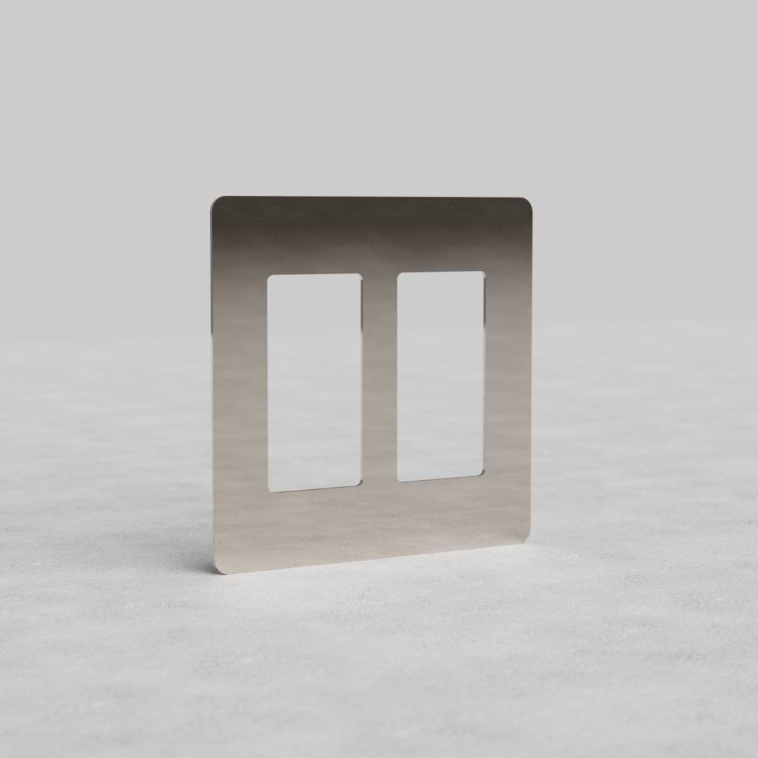 Polished nickel 2G outlet plate, Kew US design, with two rectangular cutouts for electrical sockets.