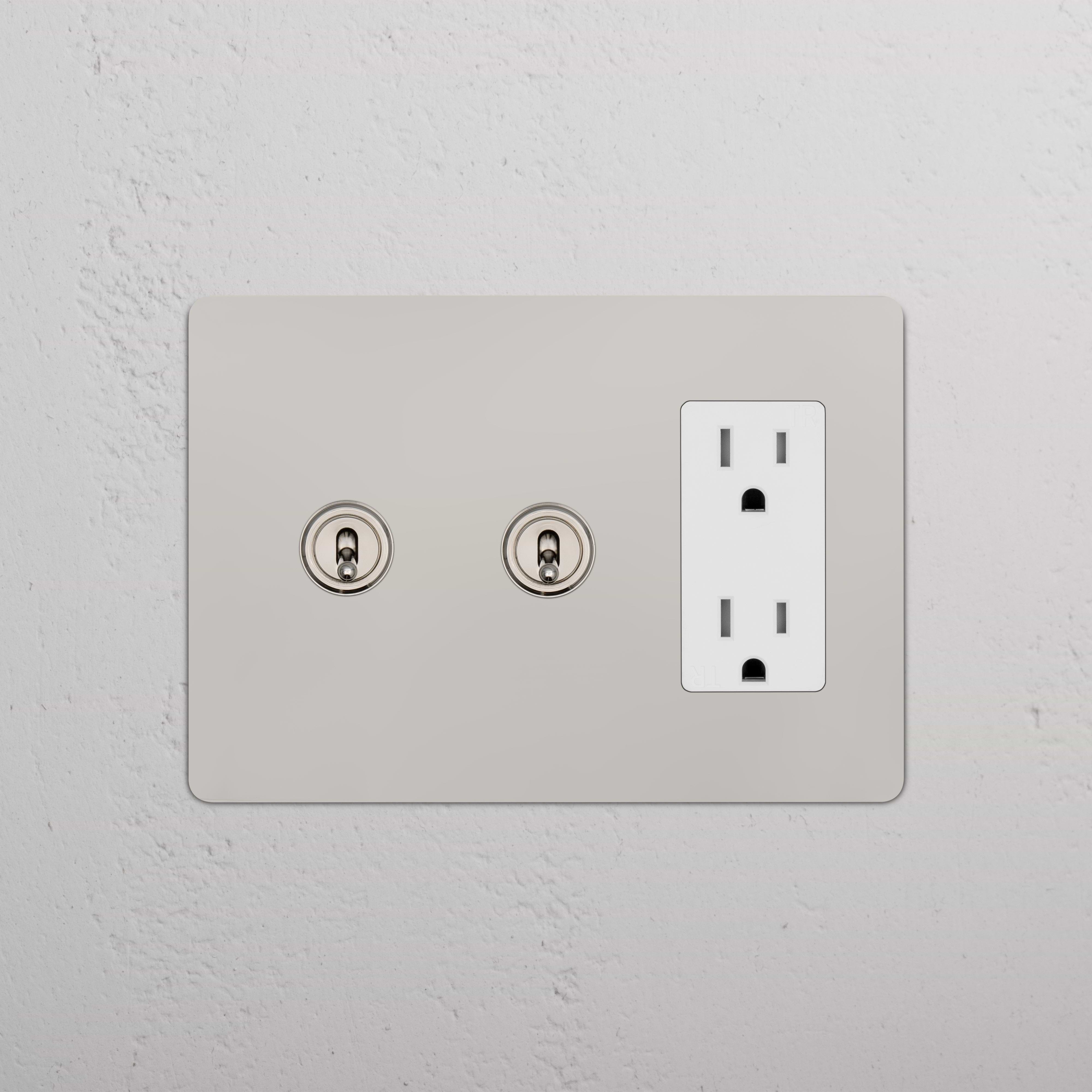 Kew 3G 2x Toggle Switch & Outlet in polished nickel white with two toggles and one outlet on plate.