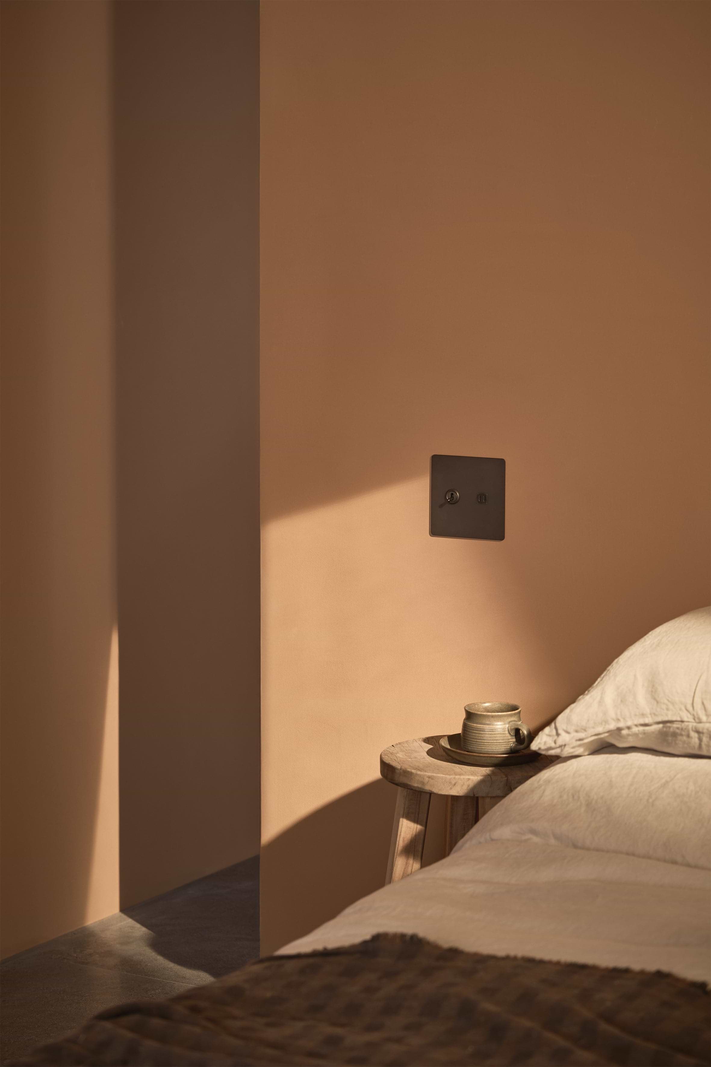 Bronze Black Kew 2G Toggle Switch & Fast Charge USB wall plate with two toggles and integrated USB port.