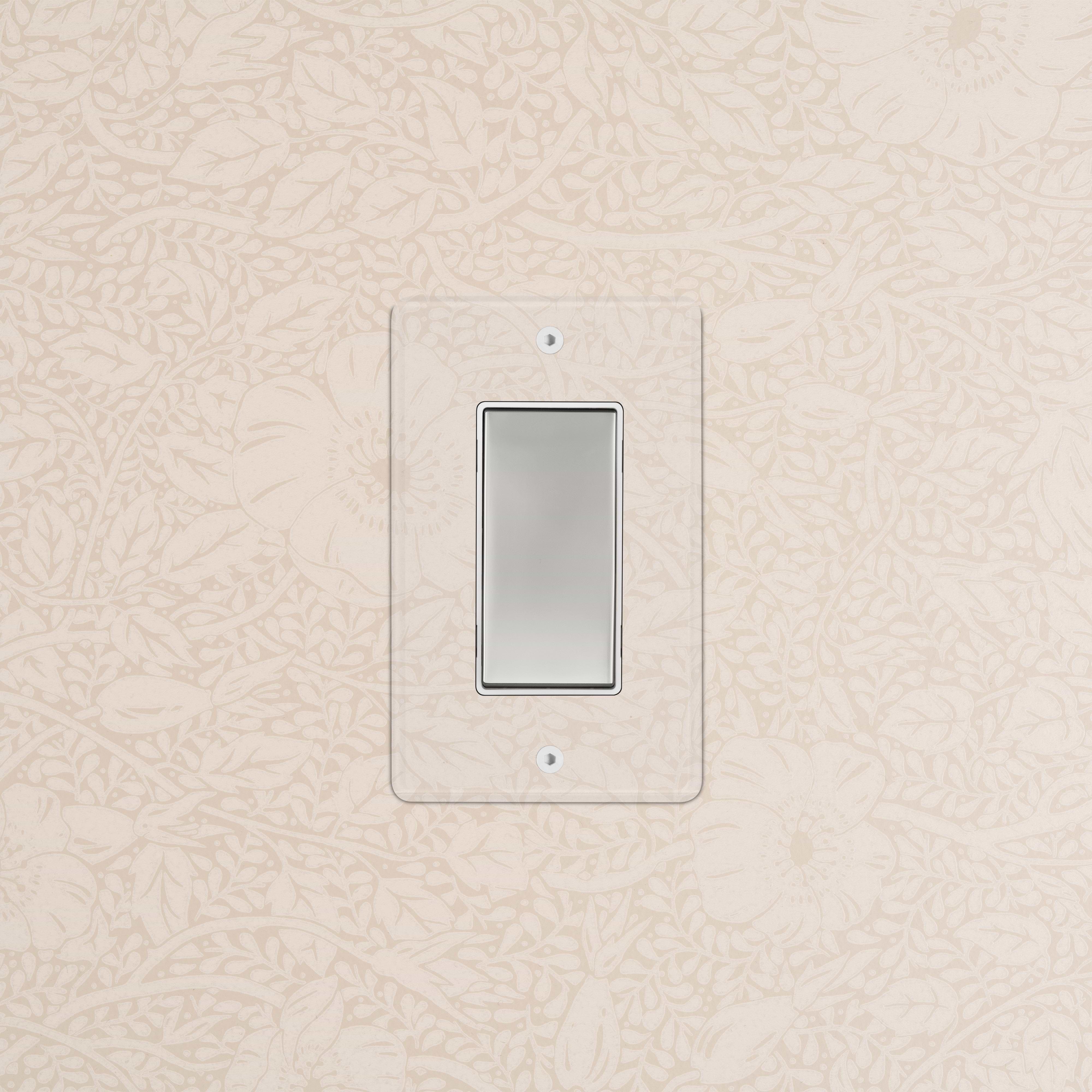Kew 1G Smart Retractive Rocker Switch in clear polished nickel white finish, installed on a beige wall.