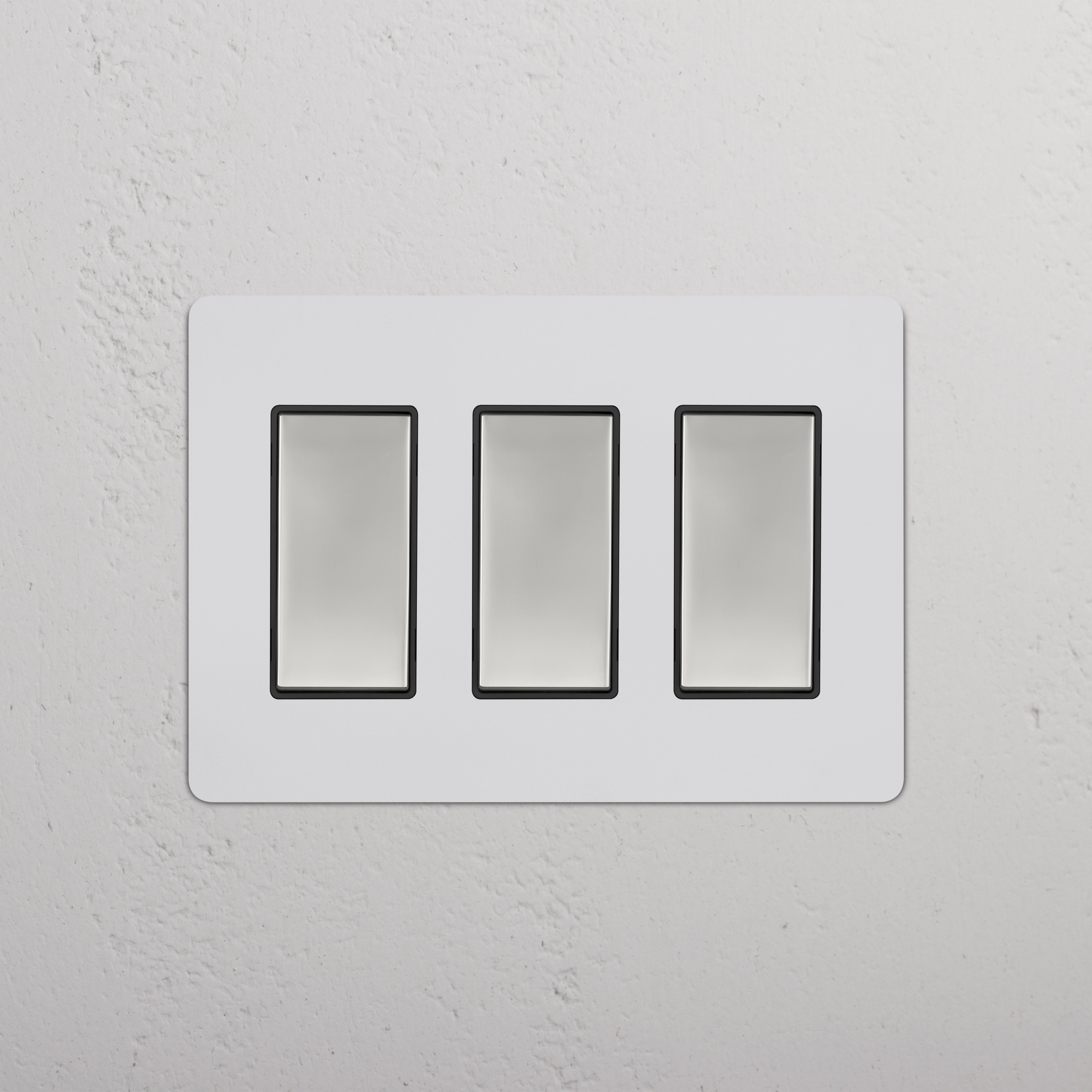 Kew 3G Rocker Switch in paintable polished nickel black with three vertical rocker switches on a rectangular plate.