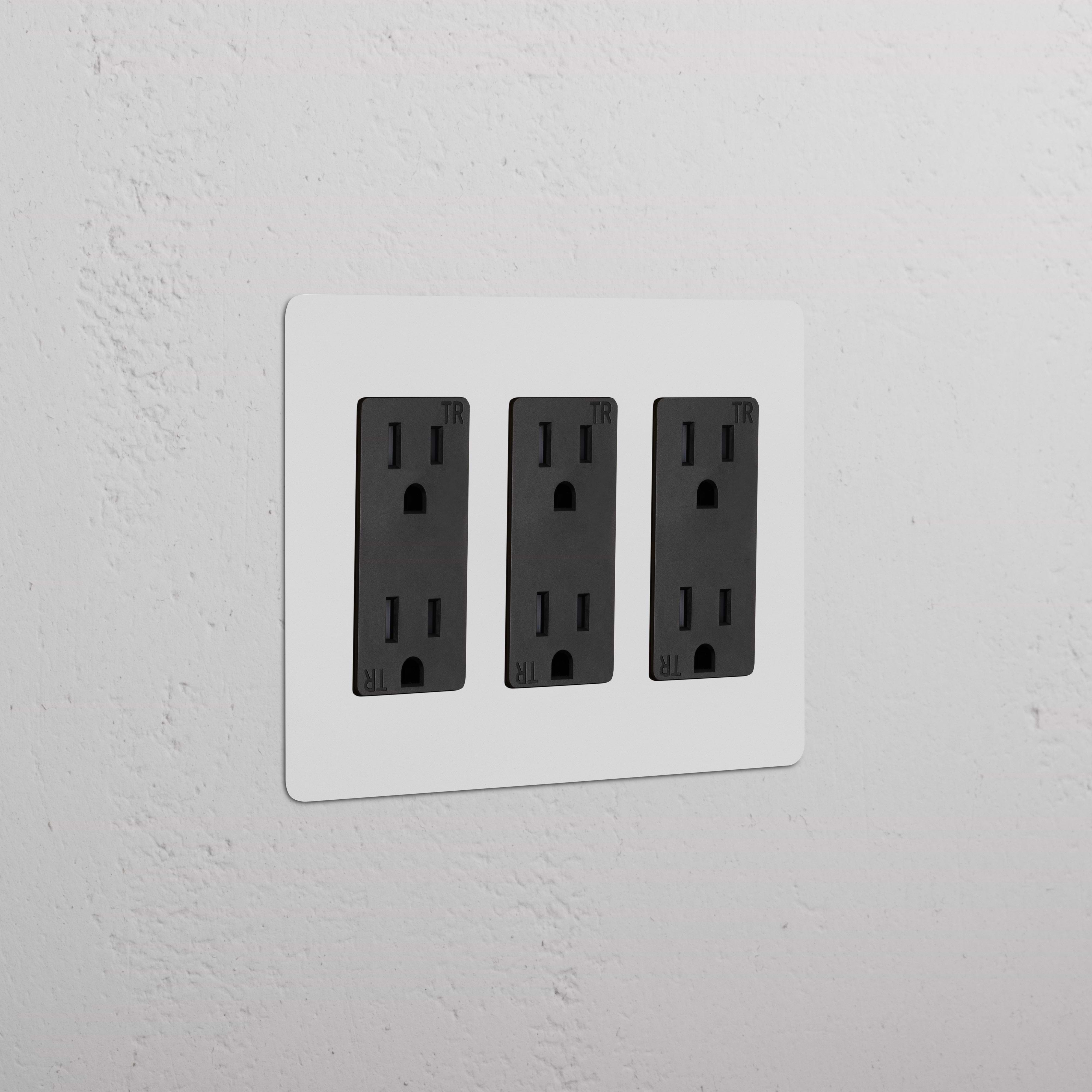 Kew 3G Outlet - Paintable Black wall plate with three black electrical outlets, designed for customization.