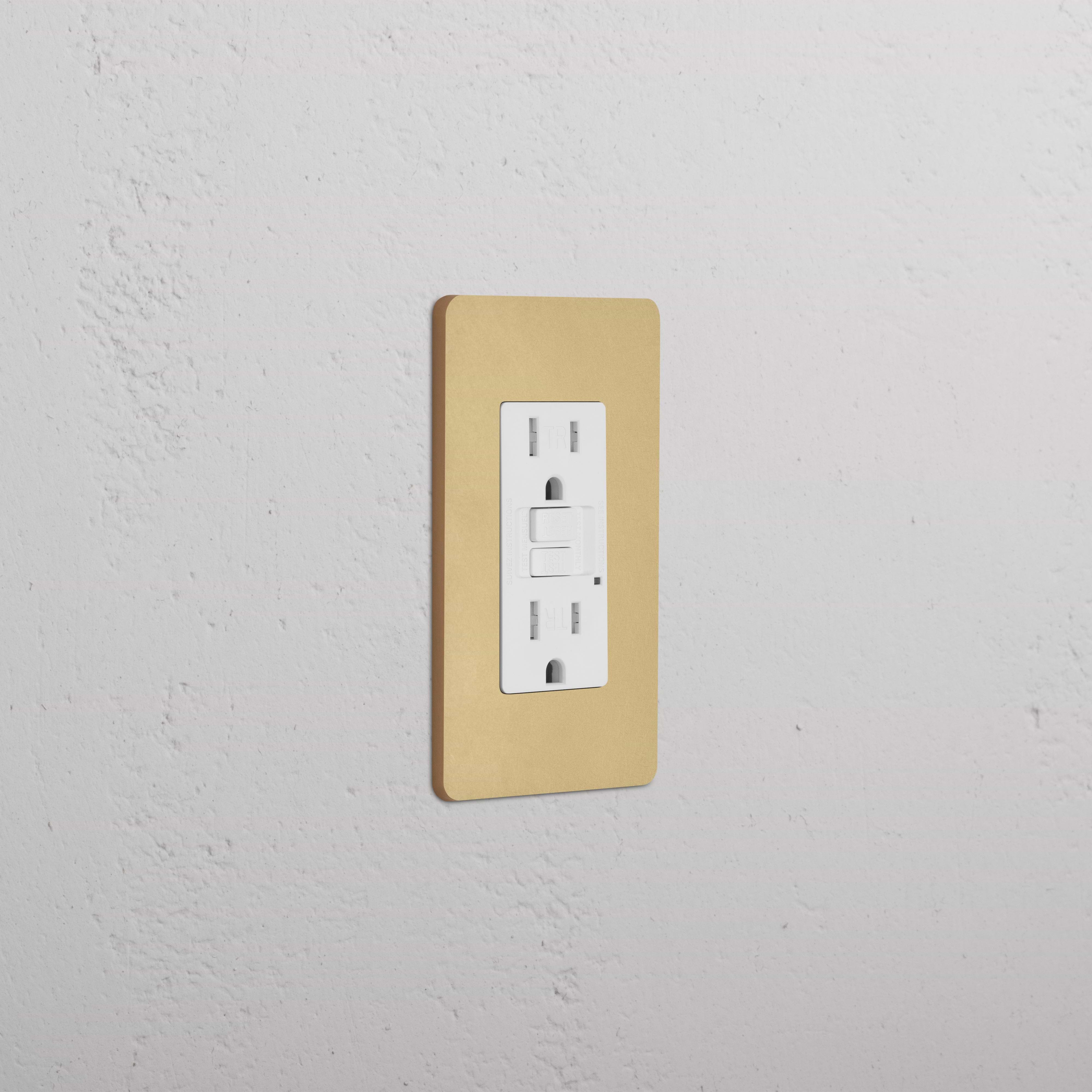 Grove 1G 15A GFCI outlet in Antique Brass White with two sockets and central test/reset buttons.