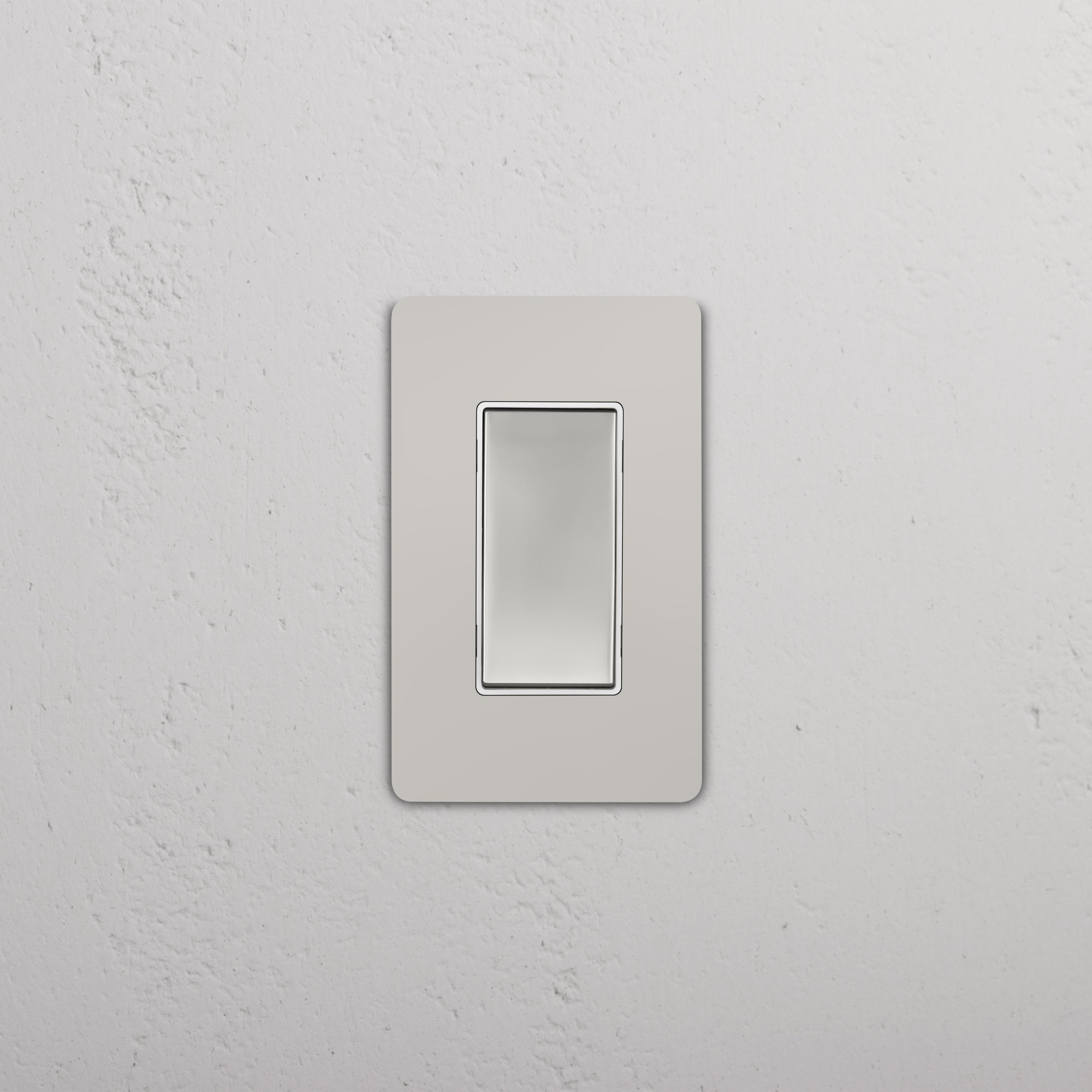 Grove 1G Four Way Rocker Switch in polished nickel white, wall-mounted with a rectangular faceplate.