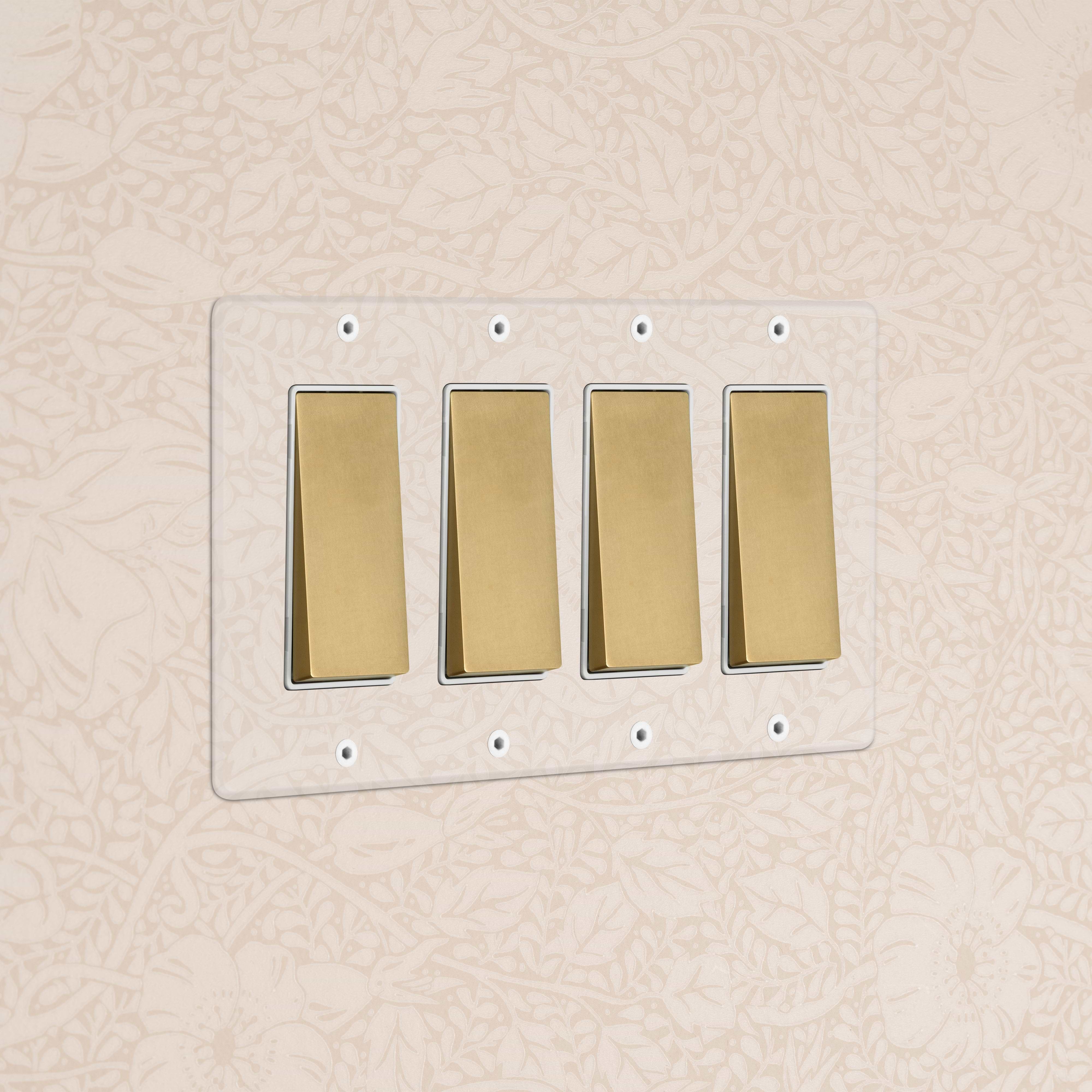 Kew 4G Rocker Switch in Clear Antique Brass White finish, rectangular plate with four white rocker switches.
