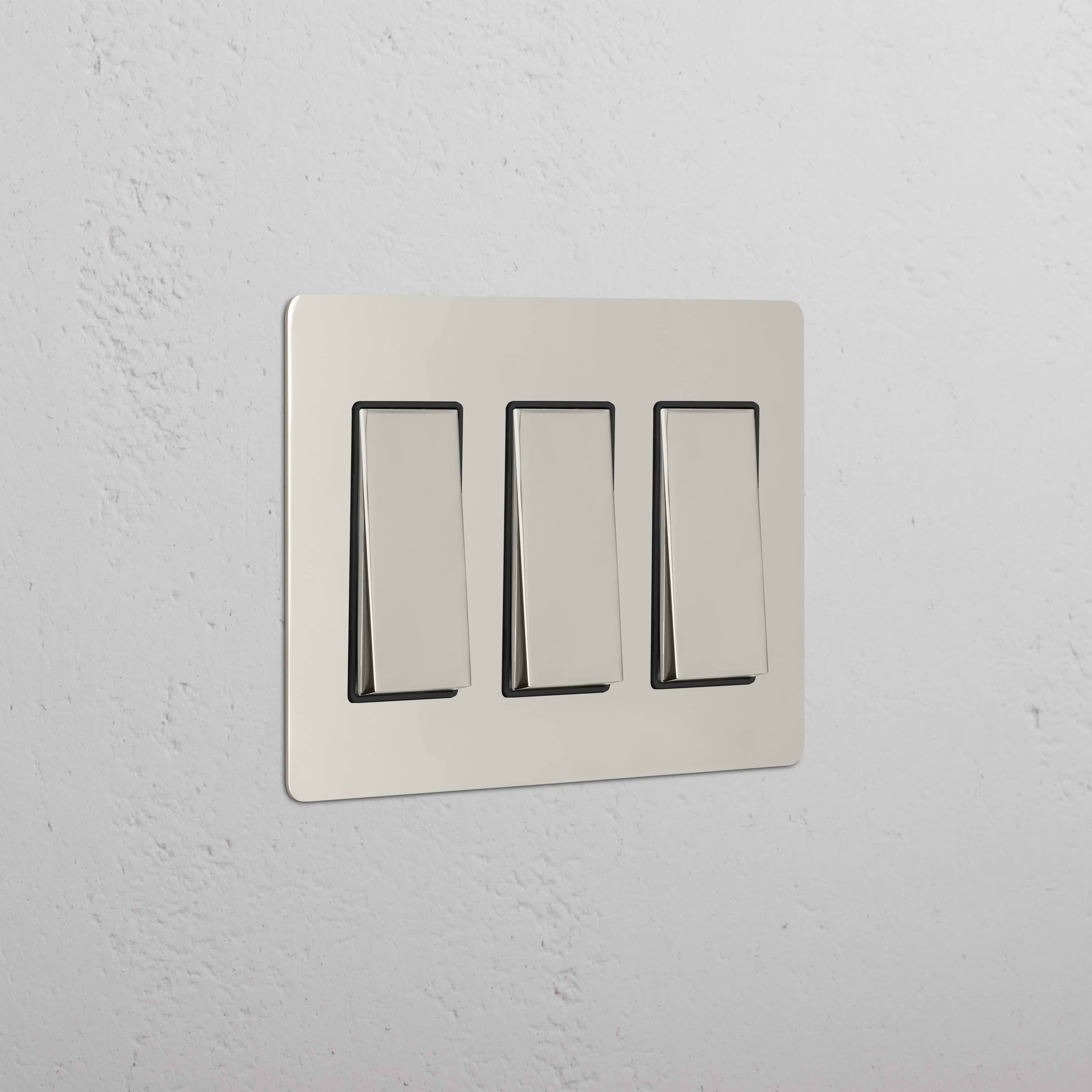Kew 3G Rocker Switch in Polished Nickel Black finish, mounted on a wall.