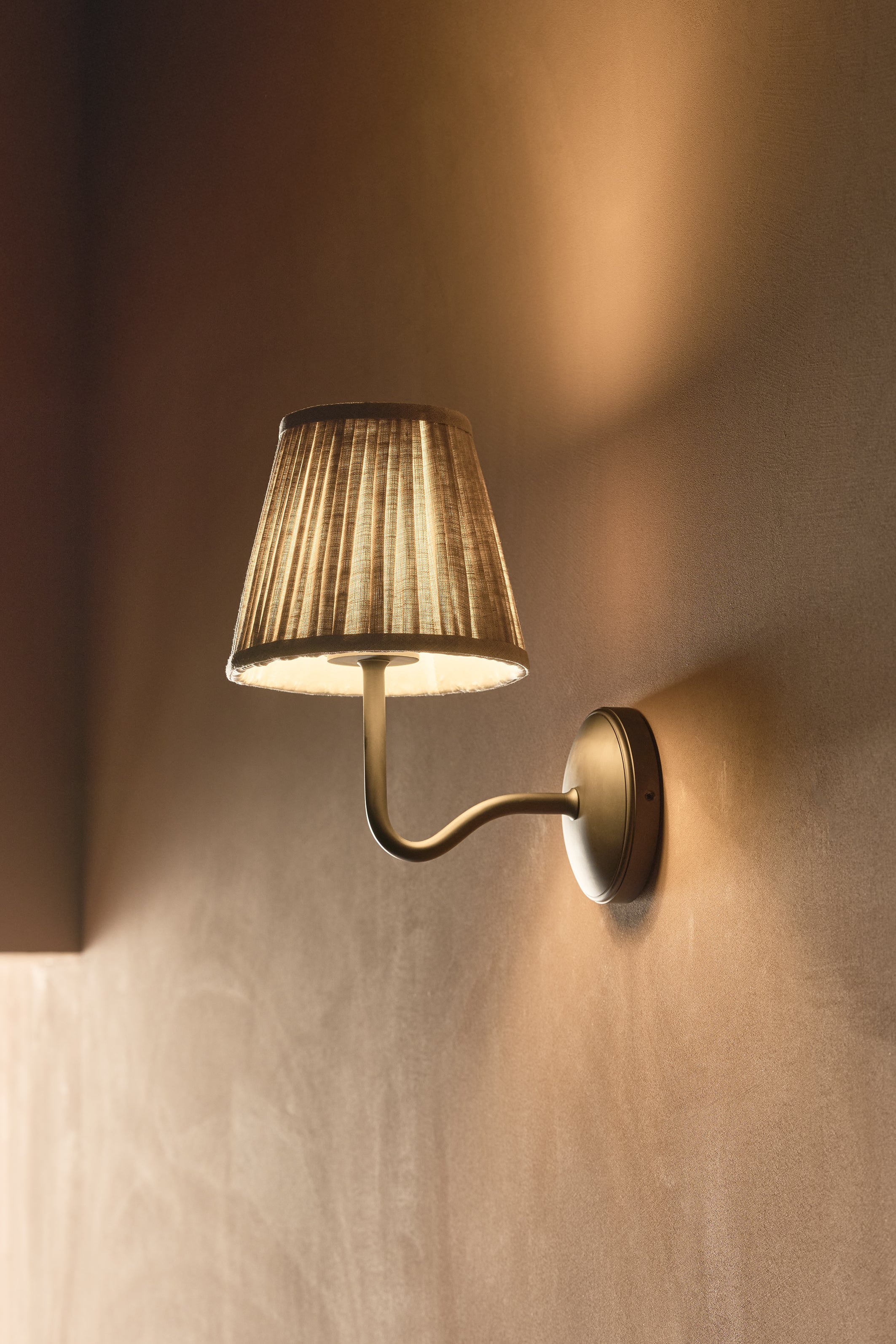 Malvern Medium Wall Light in Natural Beige with pleated shade and bronze fitting, for wall mounting.
