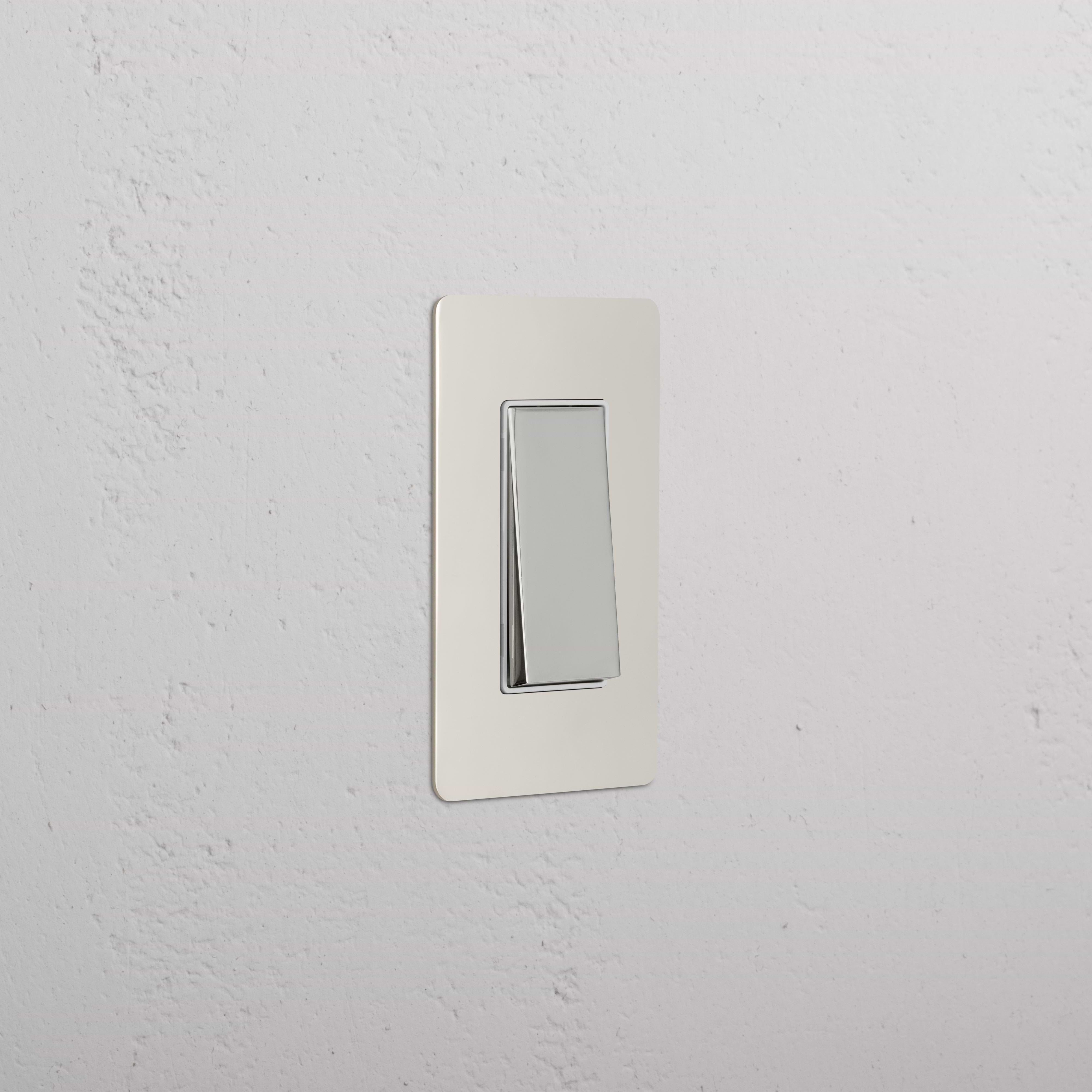 Kew 1G Four Way Rocker Switch in polished nickel white, mounted on a white wall.