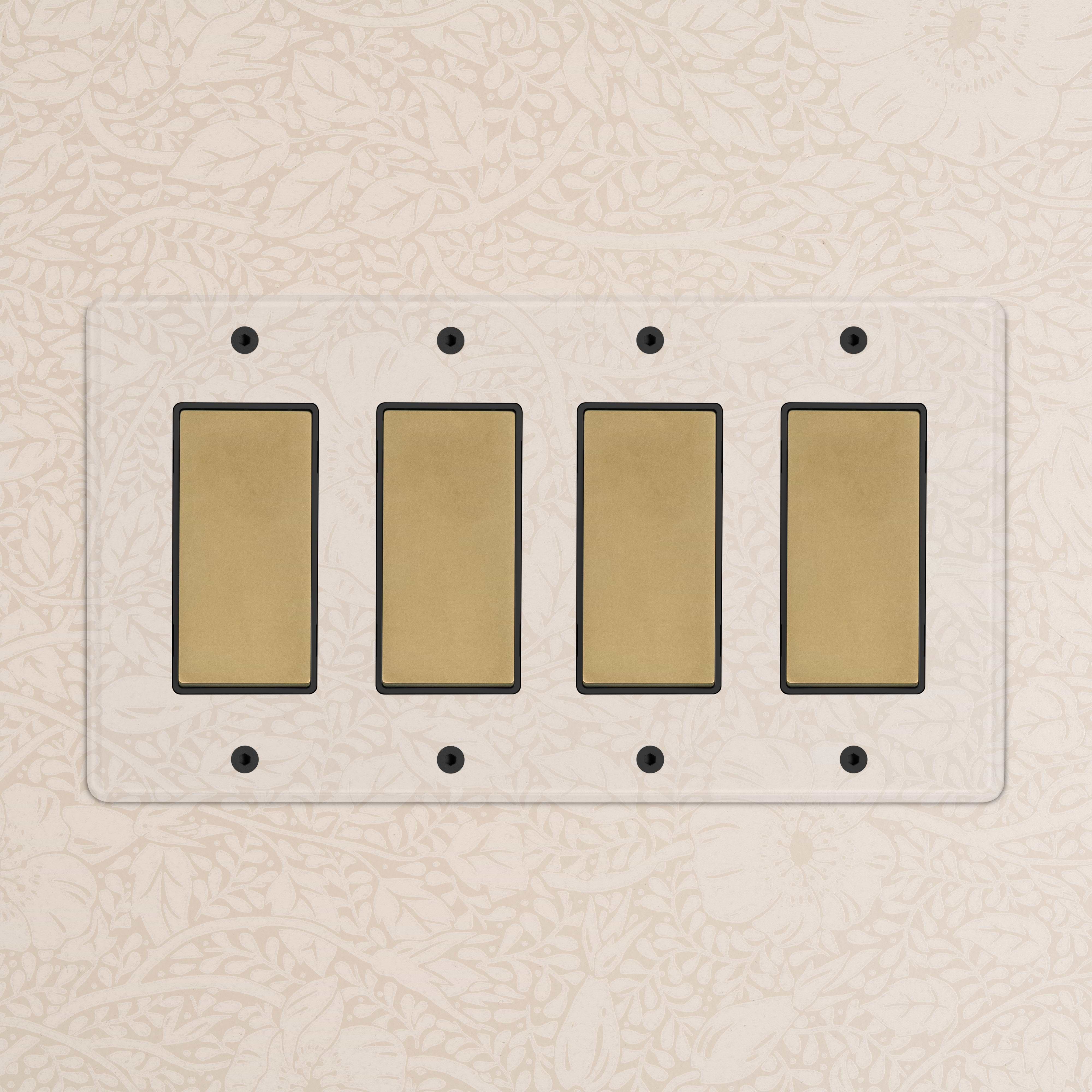 Kew 4G Rocker Switch in clear antique brass black, featuring four black rocker switches on a brass plate.