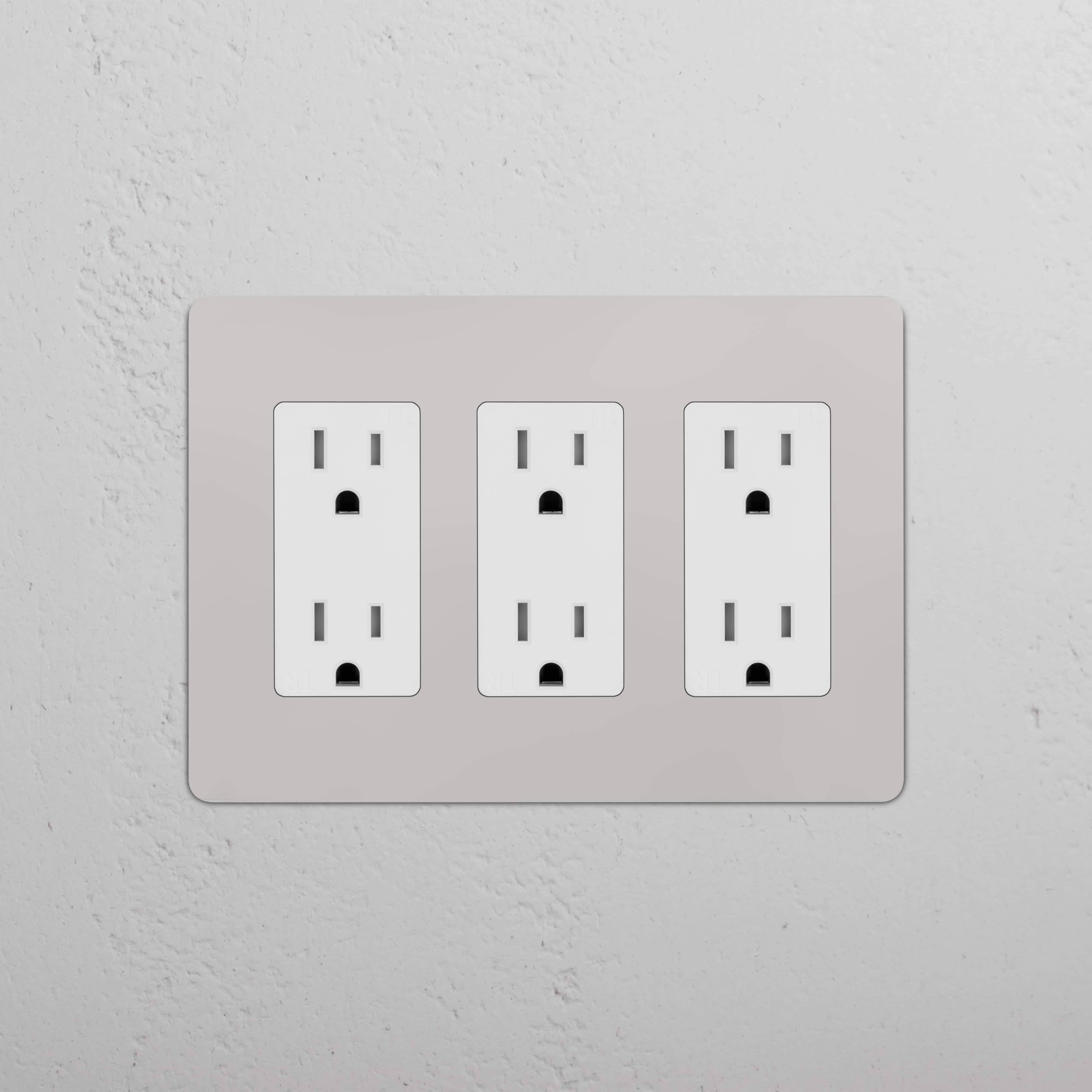 Kew 3G Outlet in Polished Nickel White, featuring three electrical outlets on a polished nickel plate.