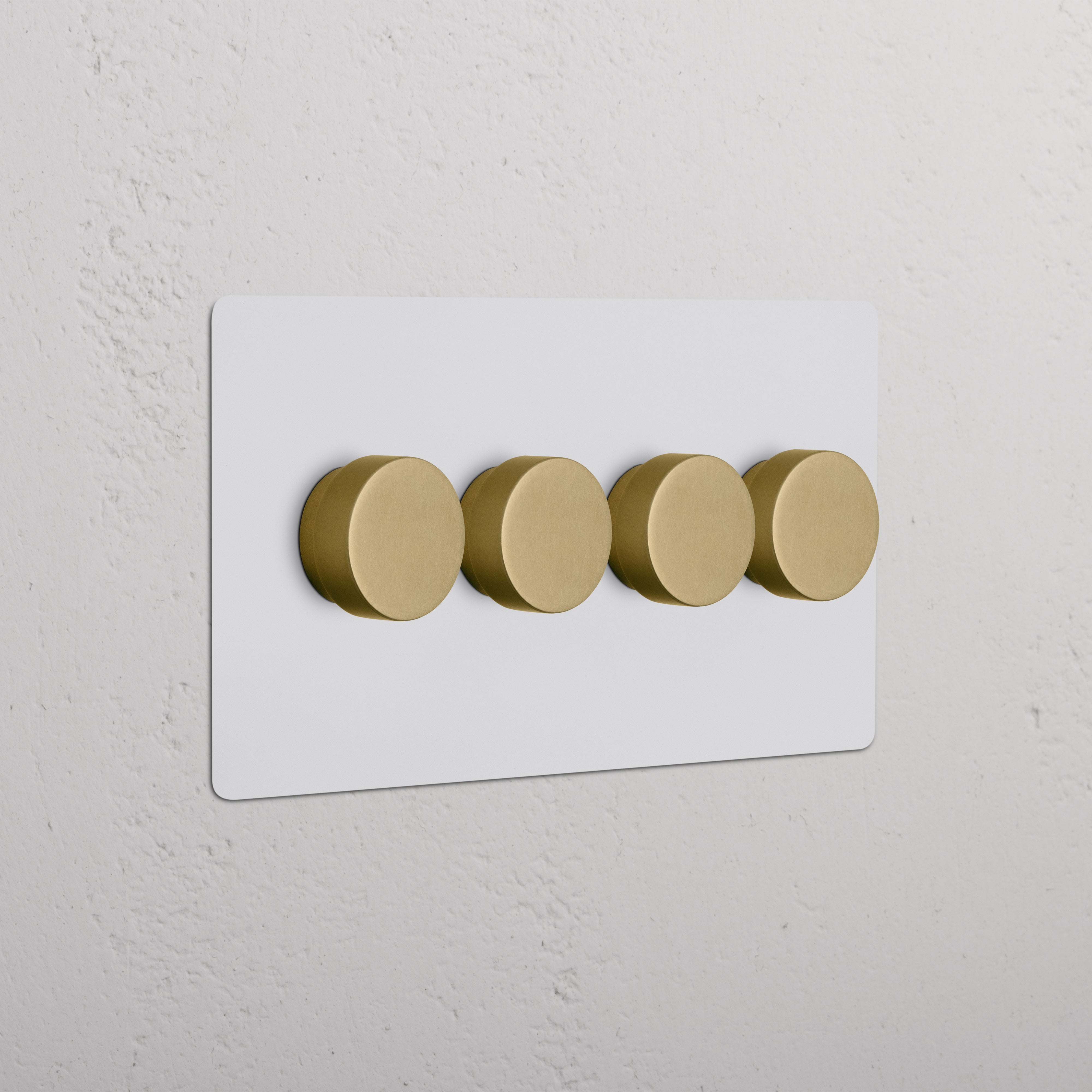 Kew 4G Dimmer Switch – Paintable Antique Brass, with four round dimmer dials on a rectangular wall plate.