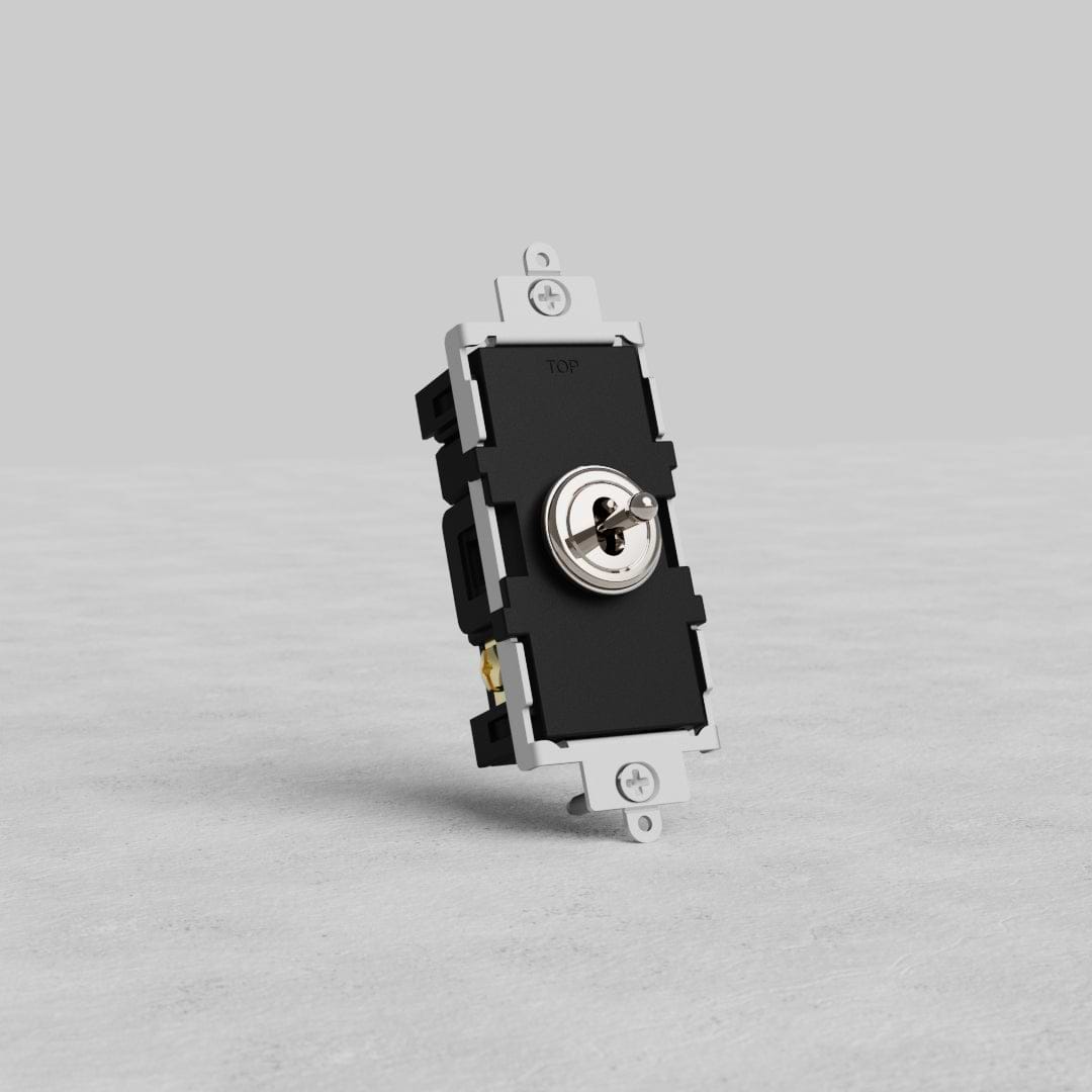 Polished nickel Center Retractive Toggle Switch with sleek finish, shown upright on a light gray surface.