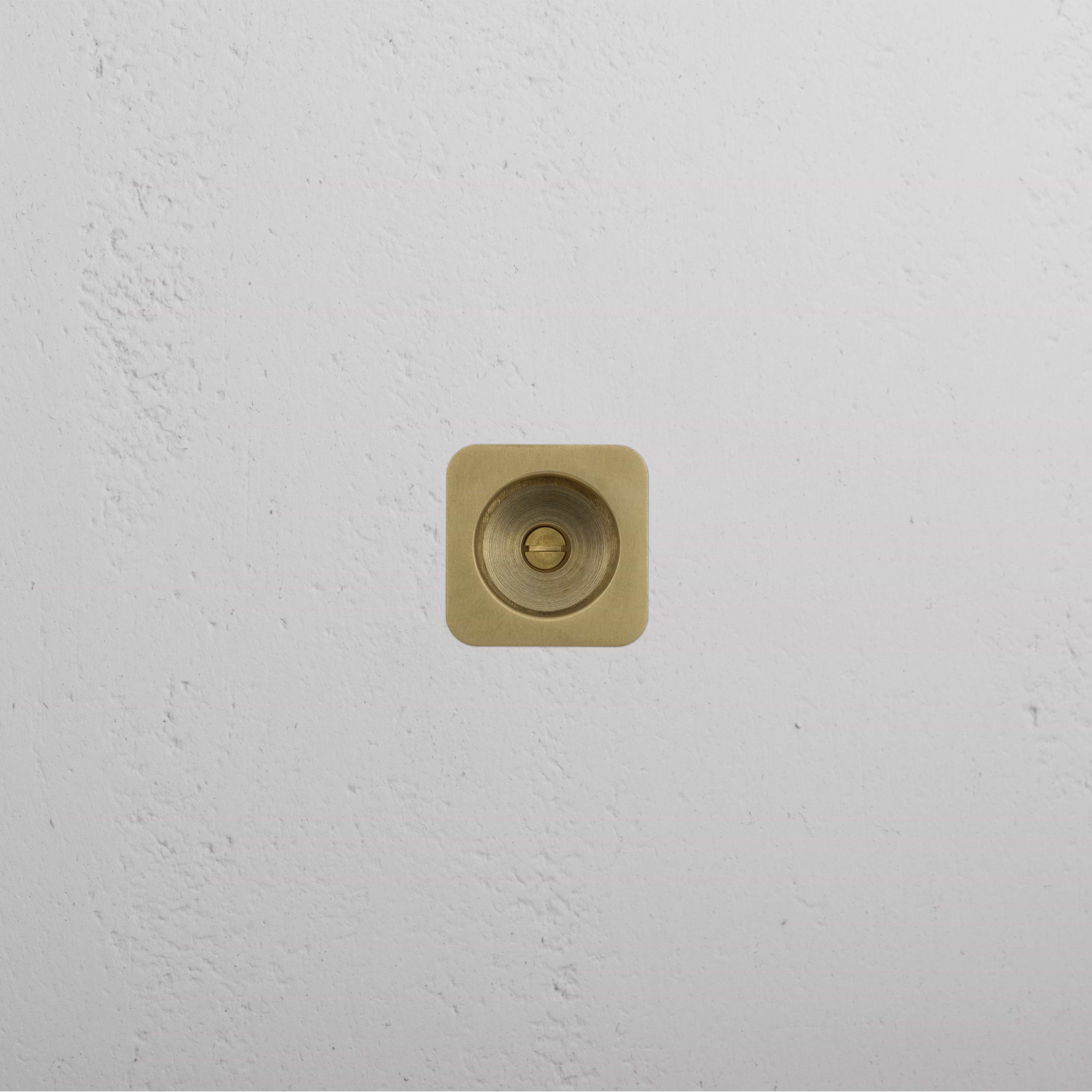 Regent Recessed Edge Pull in Antique Brass finish, shown mounted on a flat surface.