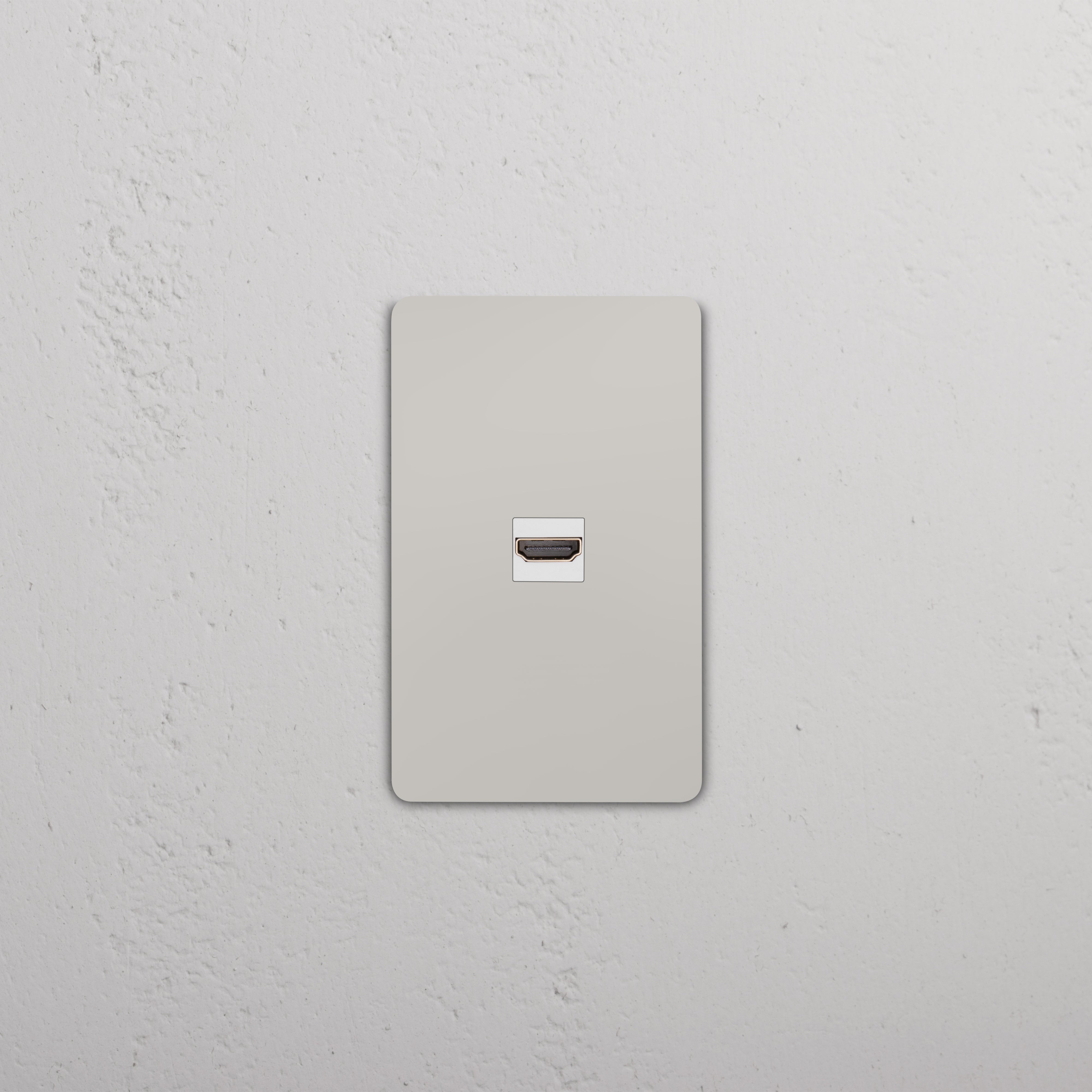 Grove 1G HDMI Keystone in polished nickel on a white wall plate, designed for HDMI connectivity.