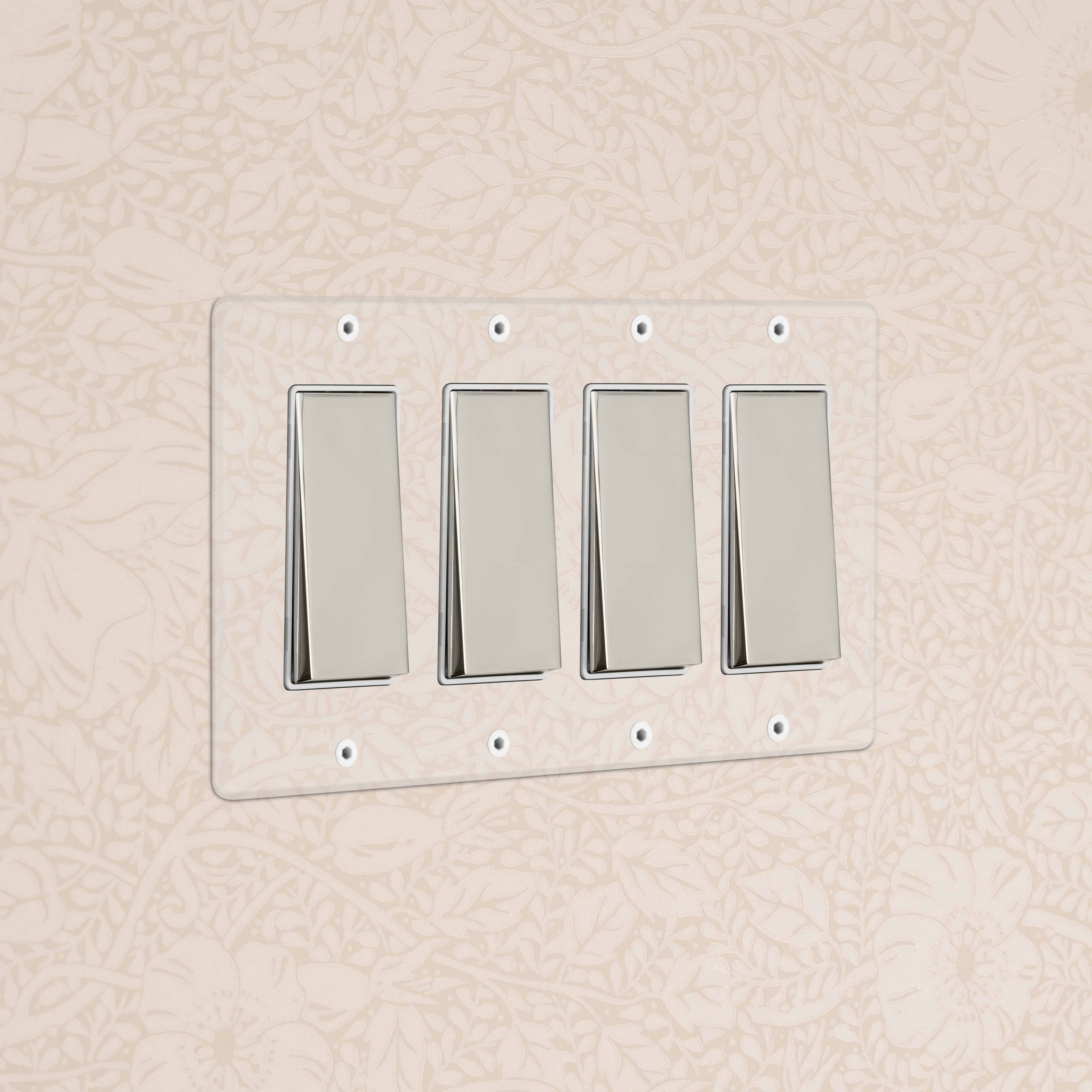 Kew 4G Rocker Switch in Clear Polished Nickel White with four switches on a clear plate, wall-mounted.