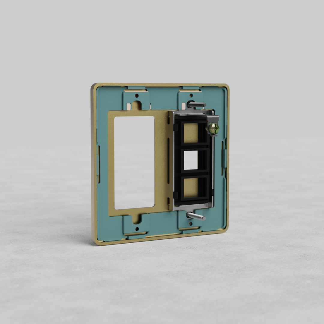 Antique Brass 2-gang outlet and keystone wall plate, Grove US style, on light gray surface.