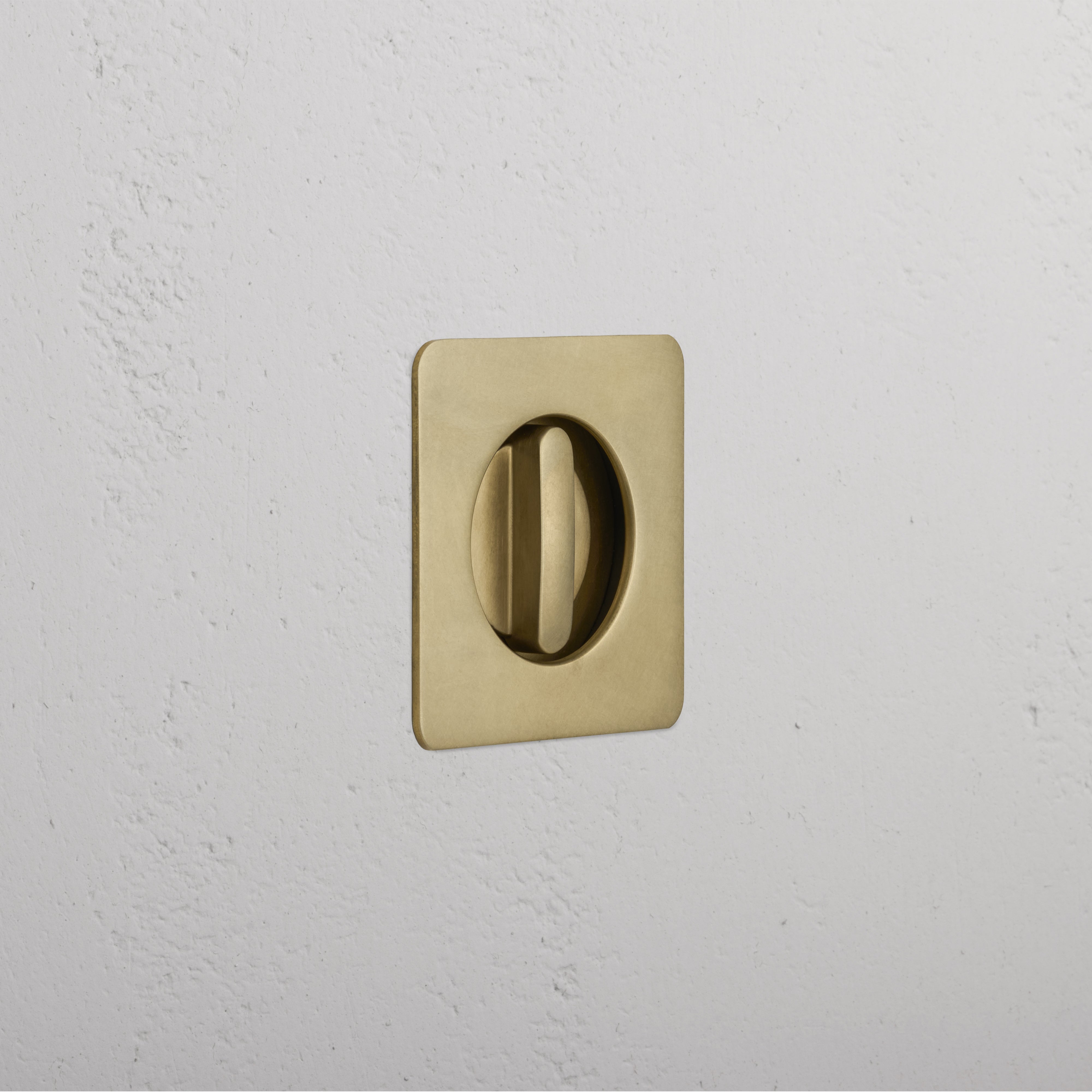 Regent Recessed Thumbturn in Antique Brass, featuring a square plate with a circular turn handle.