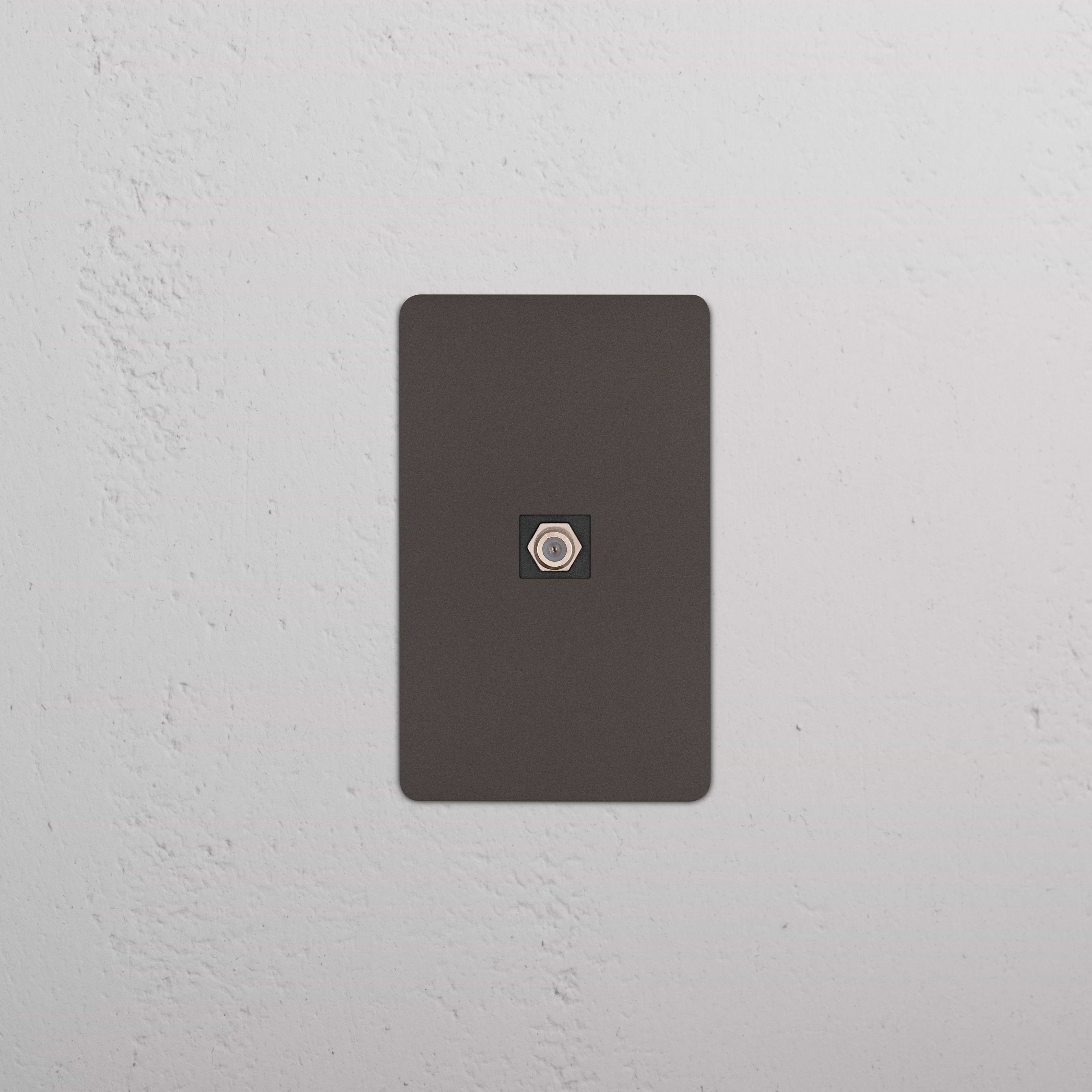 Kew 1G Satellite Keystone in Bronze Black, single-gang plate with satellite connector, wall-mounted.