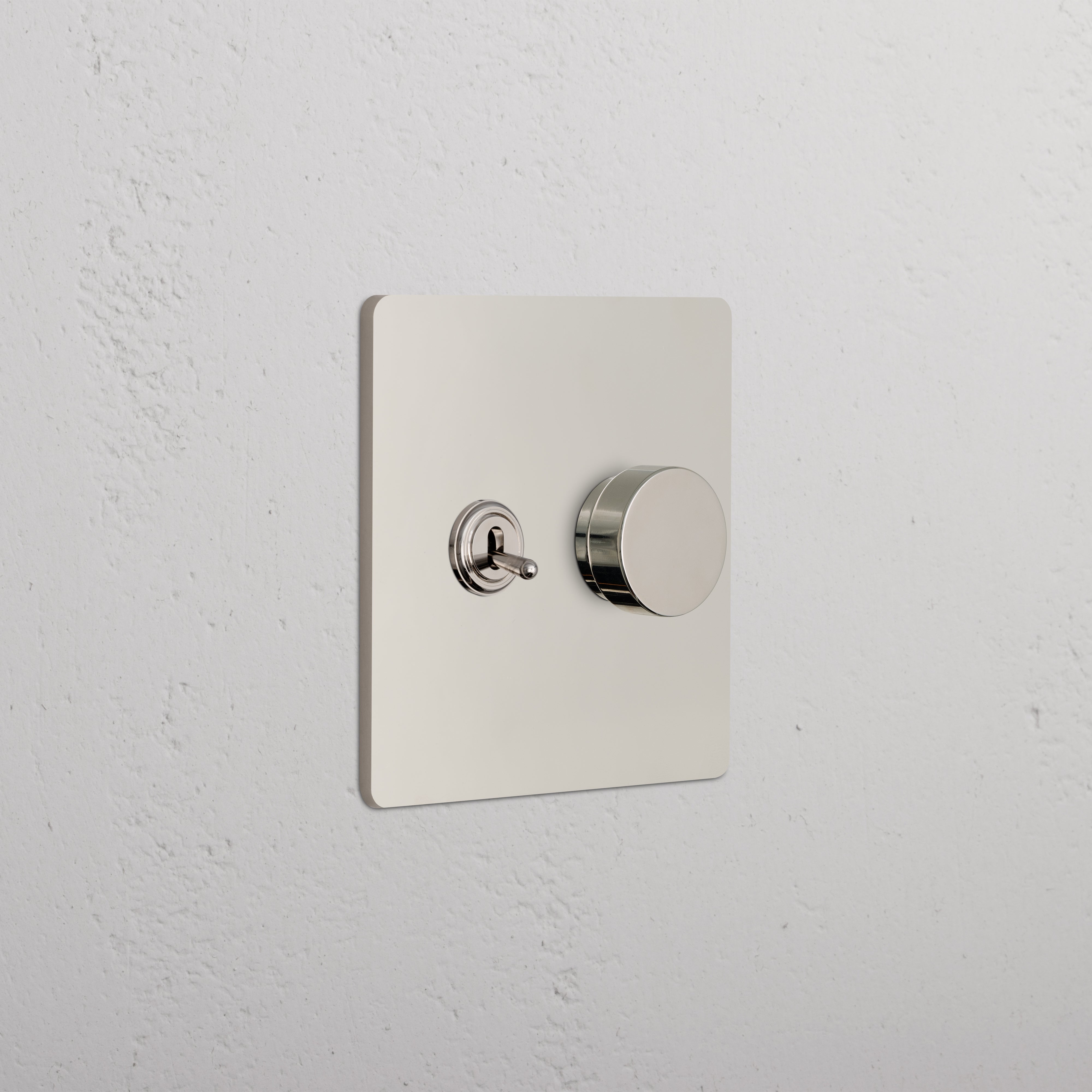 Grove 2G Toggle & Dimmer Switch in polished nickel with toggle and round dimmer on a square plate.