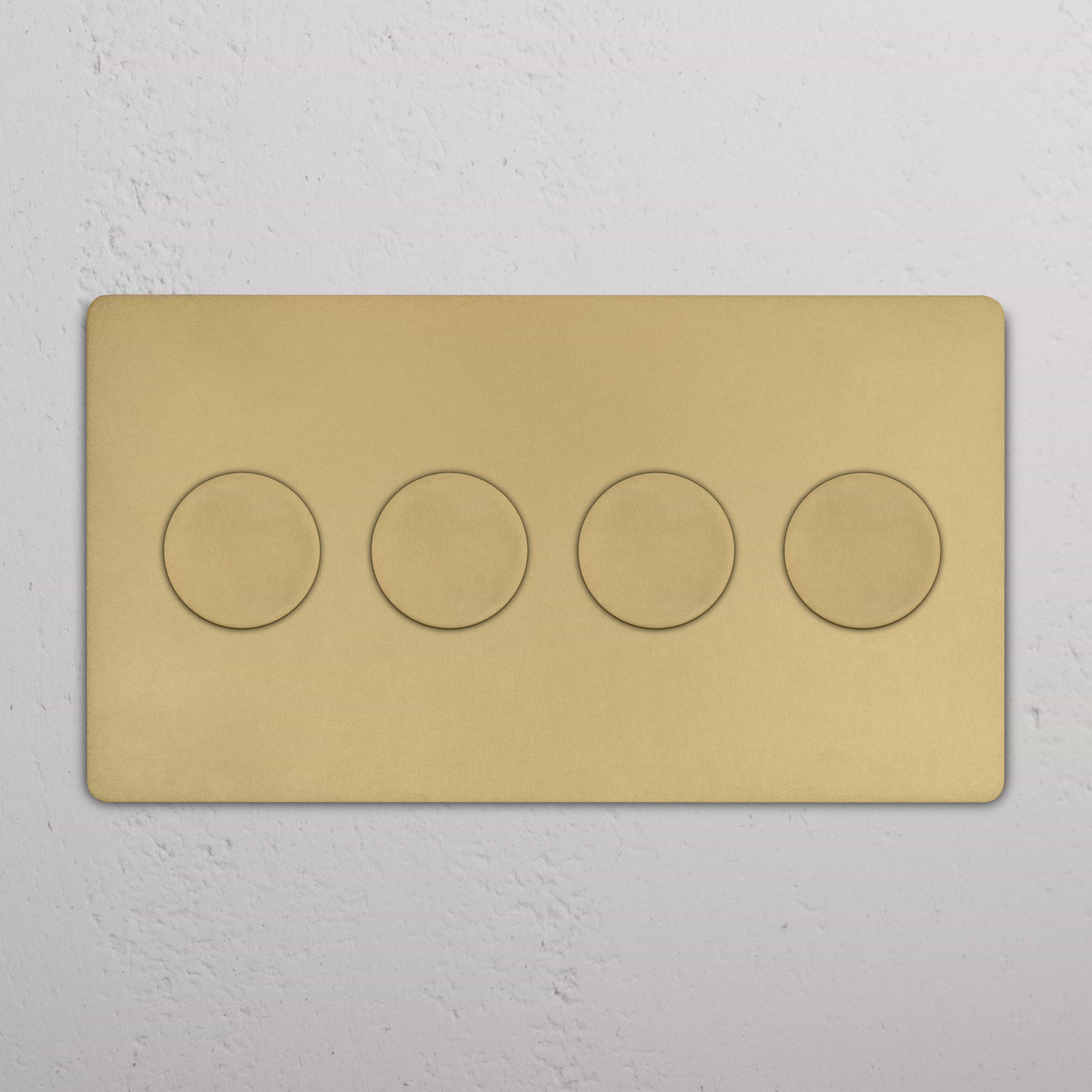 Grove 4G Dimmer Switch in antique brass finish with four round dimmer knobs on a rectangular plate.