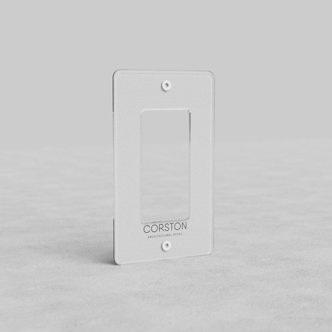 Clear 1G Outlet Plate Kew US with center cutout, rectangular design, “CORSTON” branding at bottom.