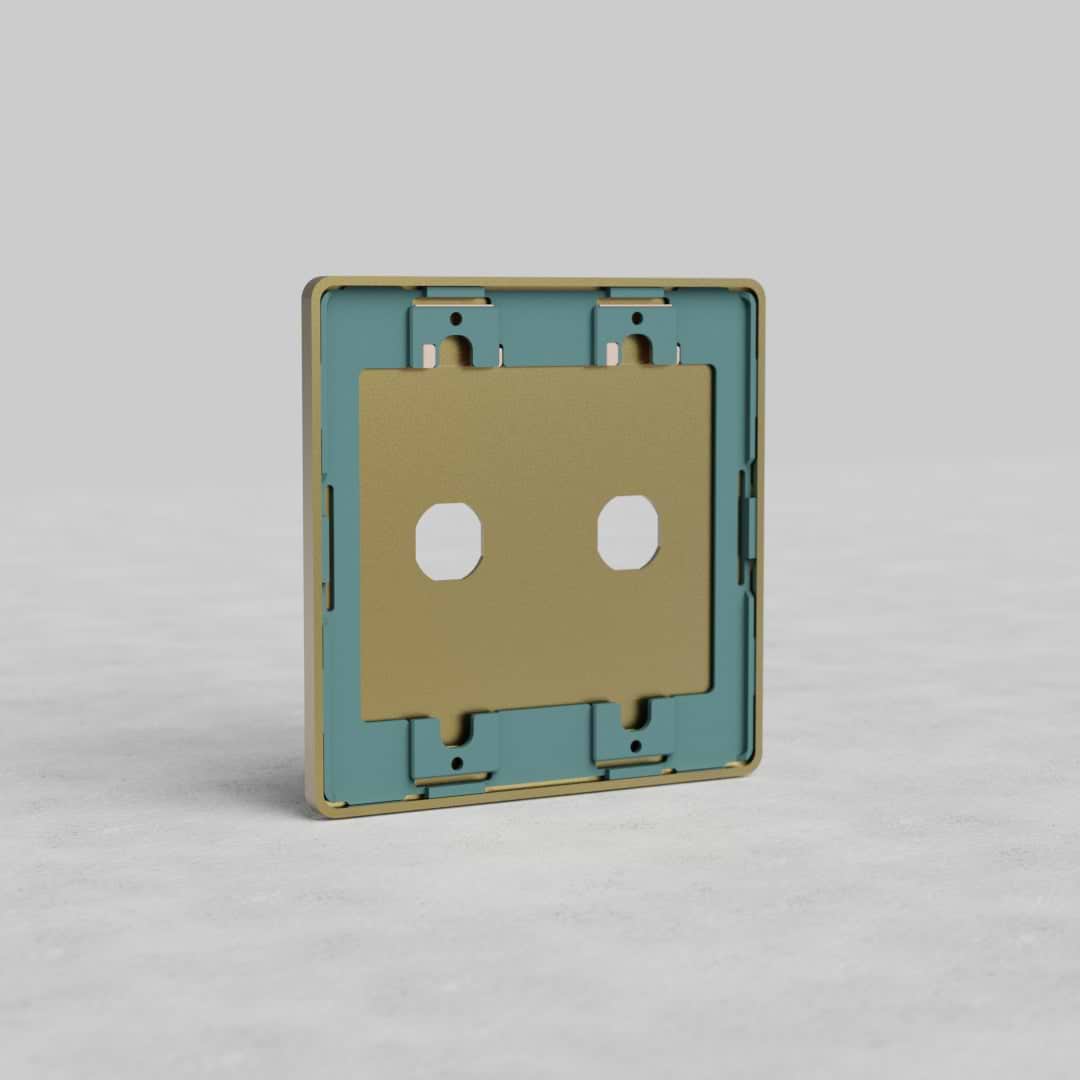 Rectangular 2G Switch Plate Grove US in antique brass finish with two switch openings, on grey background.