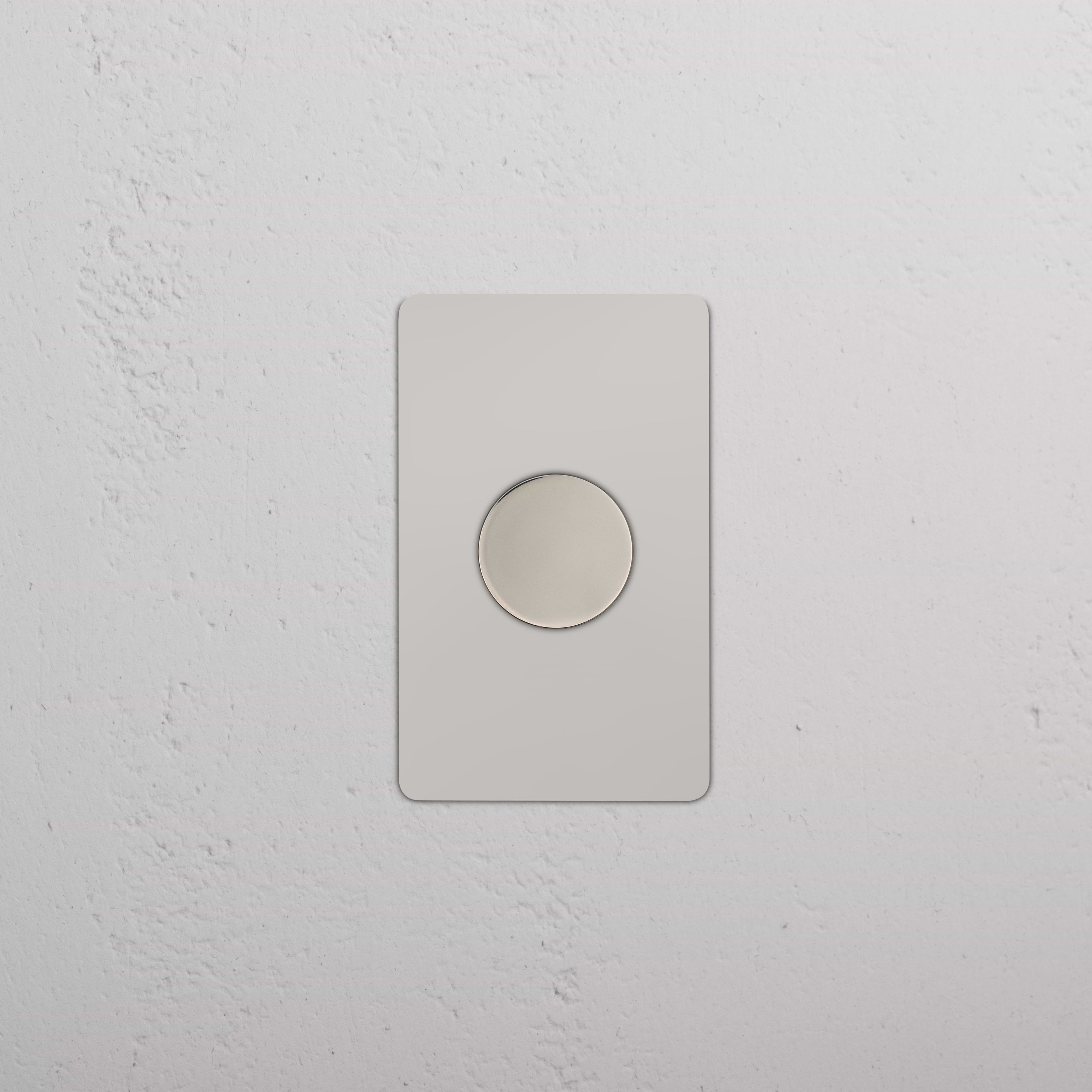 Kew 1G Dimmer Switch in polished nickel, featuring a single circular dial on a rectangular plate.