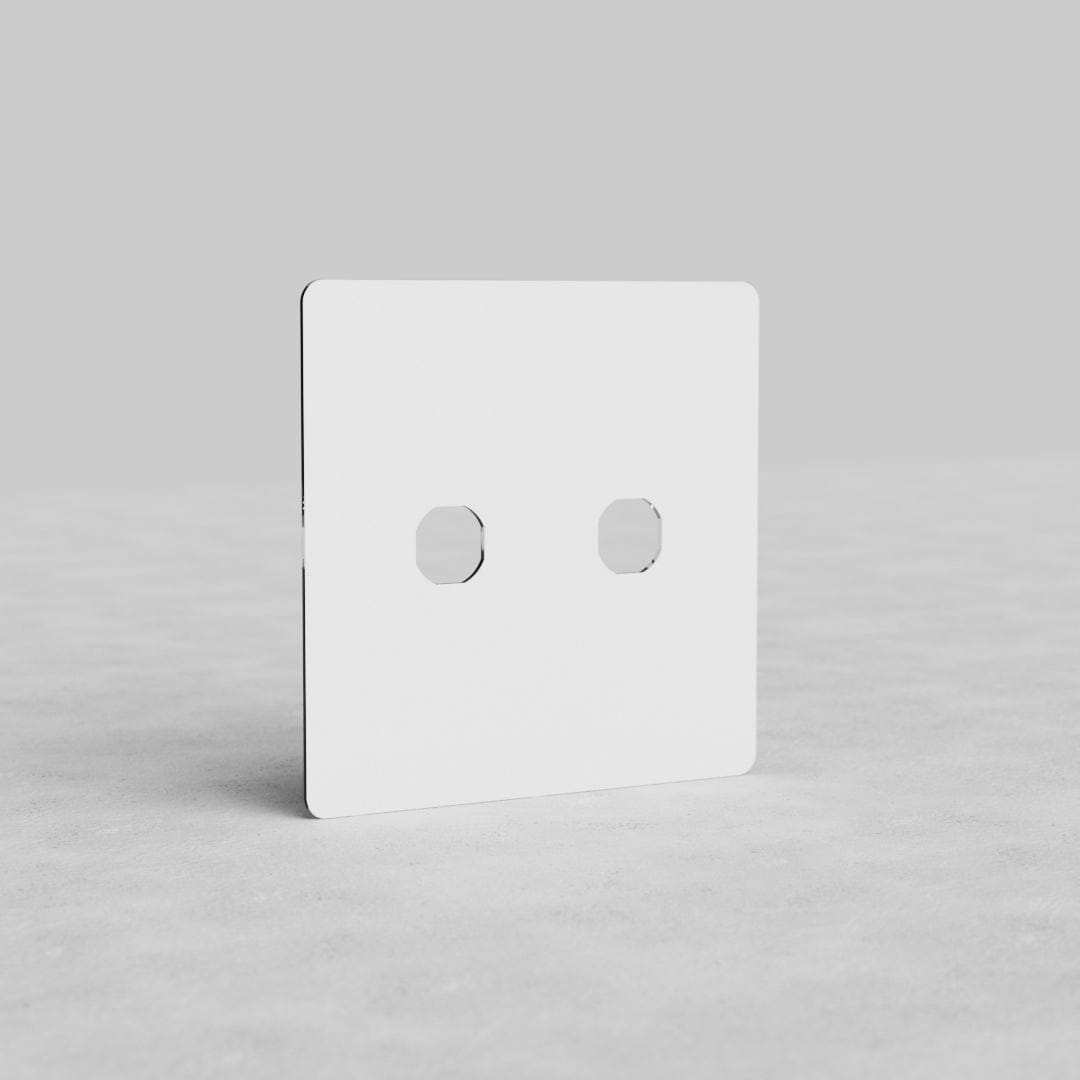 Clear 2G switch plate (Kew US) with two cutouts, displayed upright on a plain light gray surface.