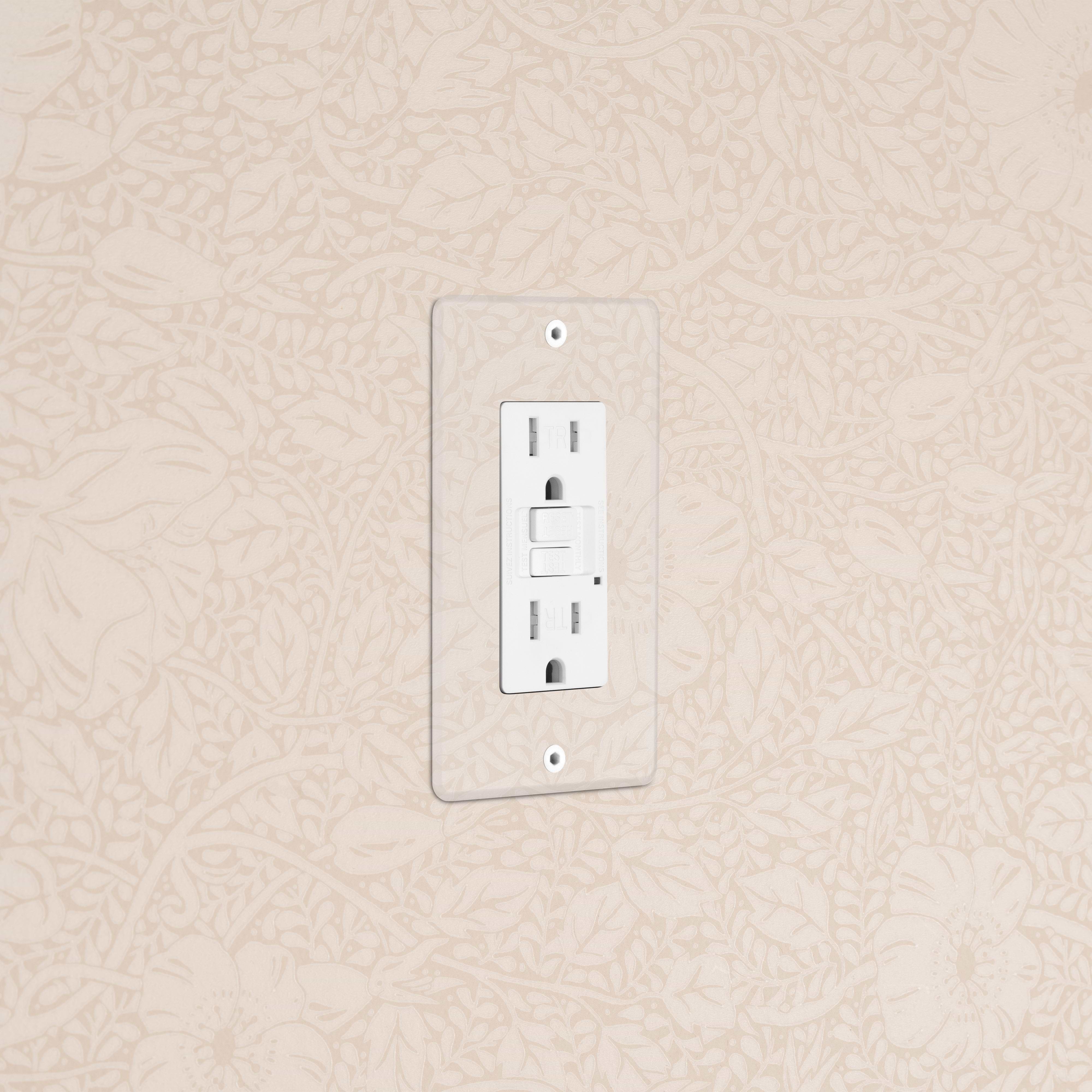 Kew 1G 15A GFCI Outlet in Clear White with test and reset buttons, installed on a light wall.