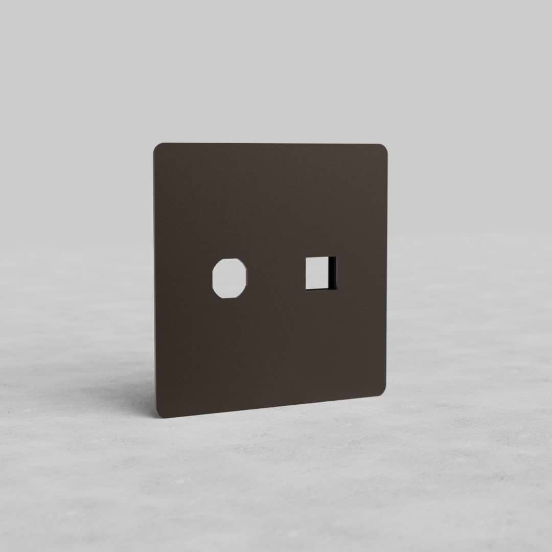 Bronze 2G Switch & Keystone Plate Kew US with two cutouts, shown upright on a plain grey background.