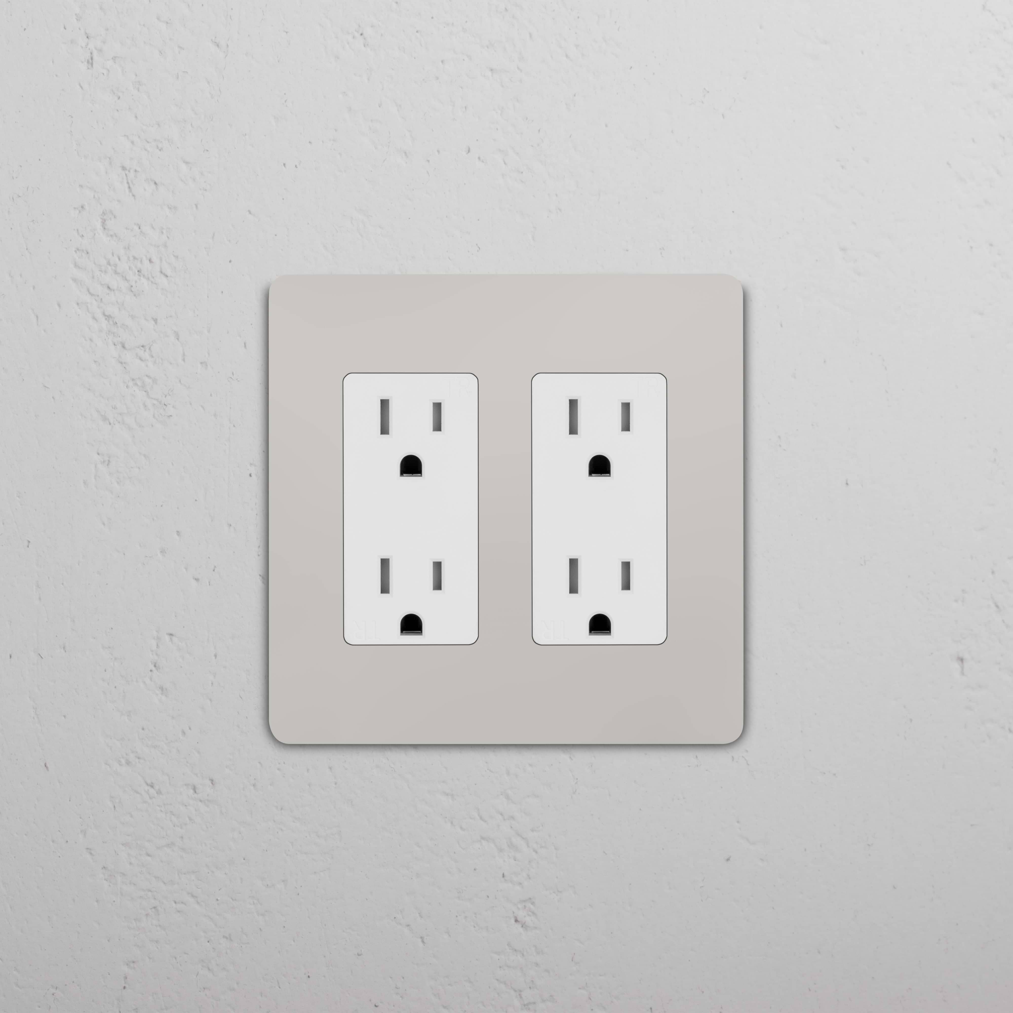Grove 2G Outlet in Polished Nickel White finish, showing two white double power sockets on a wall plate.