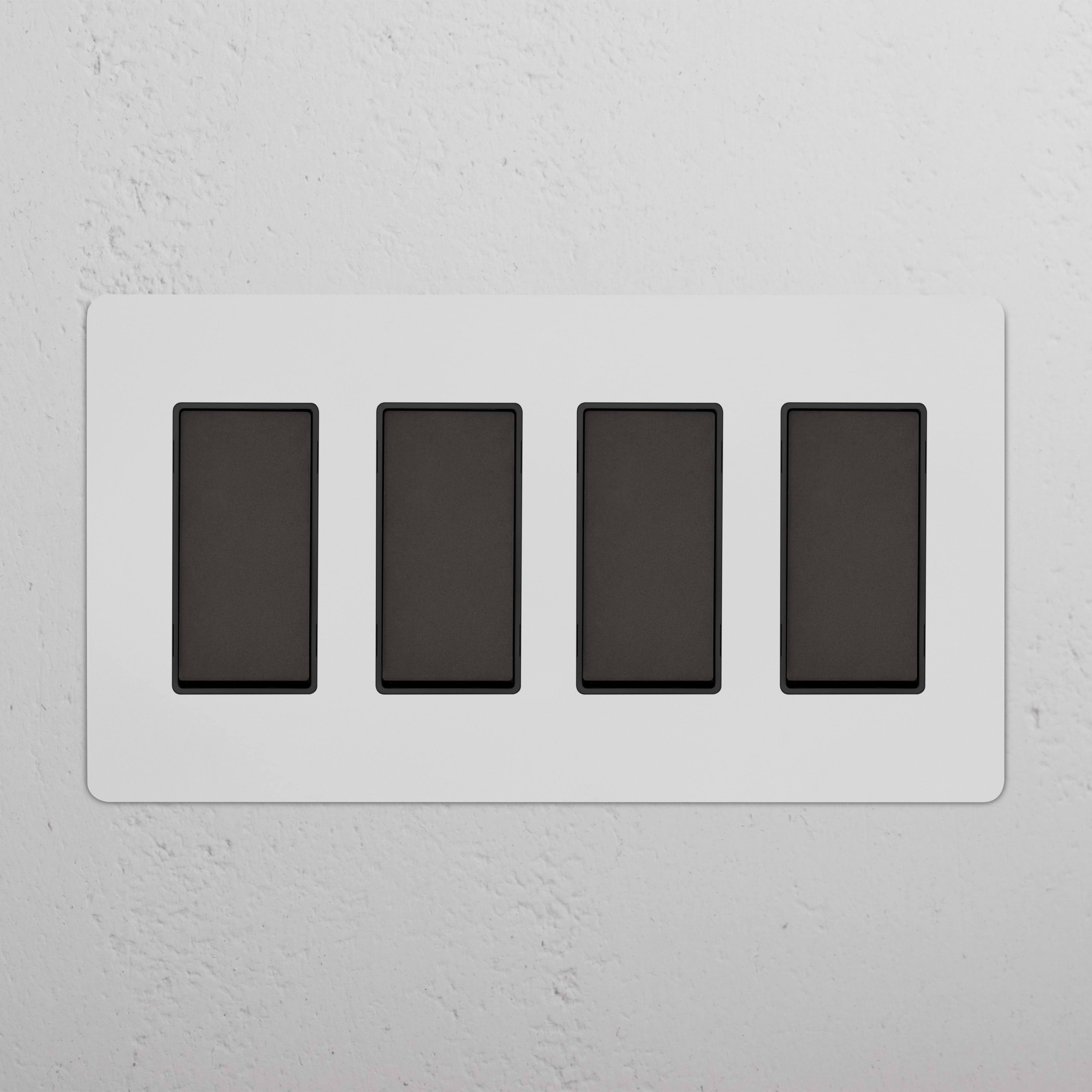 Kew 4G Rocker Switch - Paintable Bronze Black with four black rocker switches on a bronze black panel.