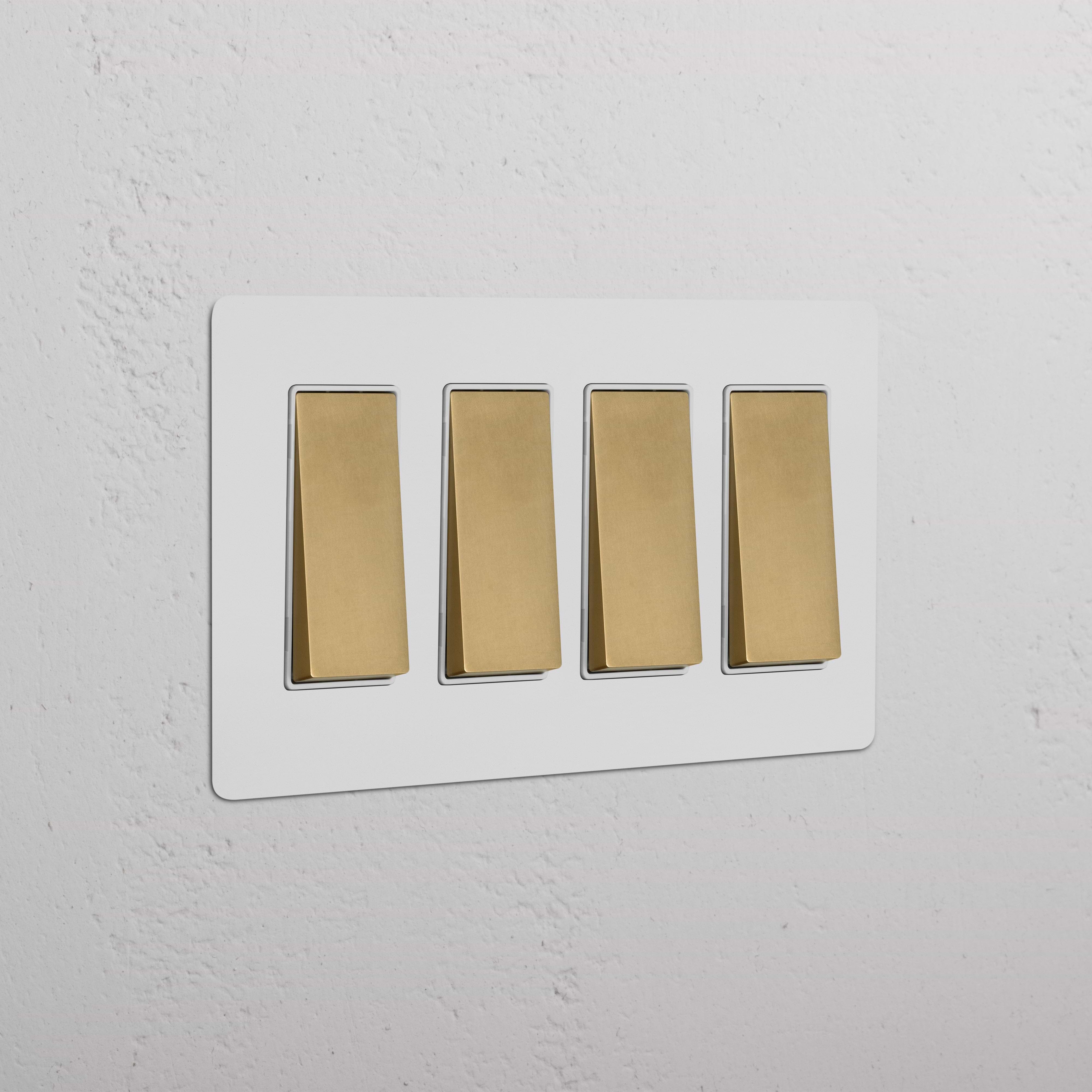 Kew 4G Rocker Switch in Paintable Antique Brass White finish, featuring four white rocker switches.