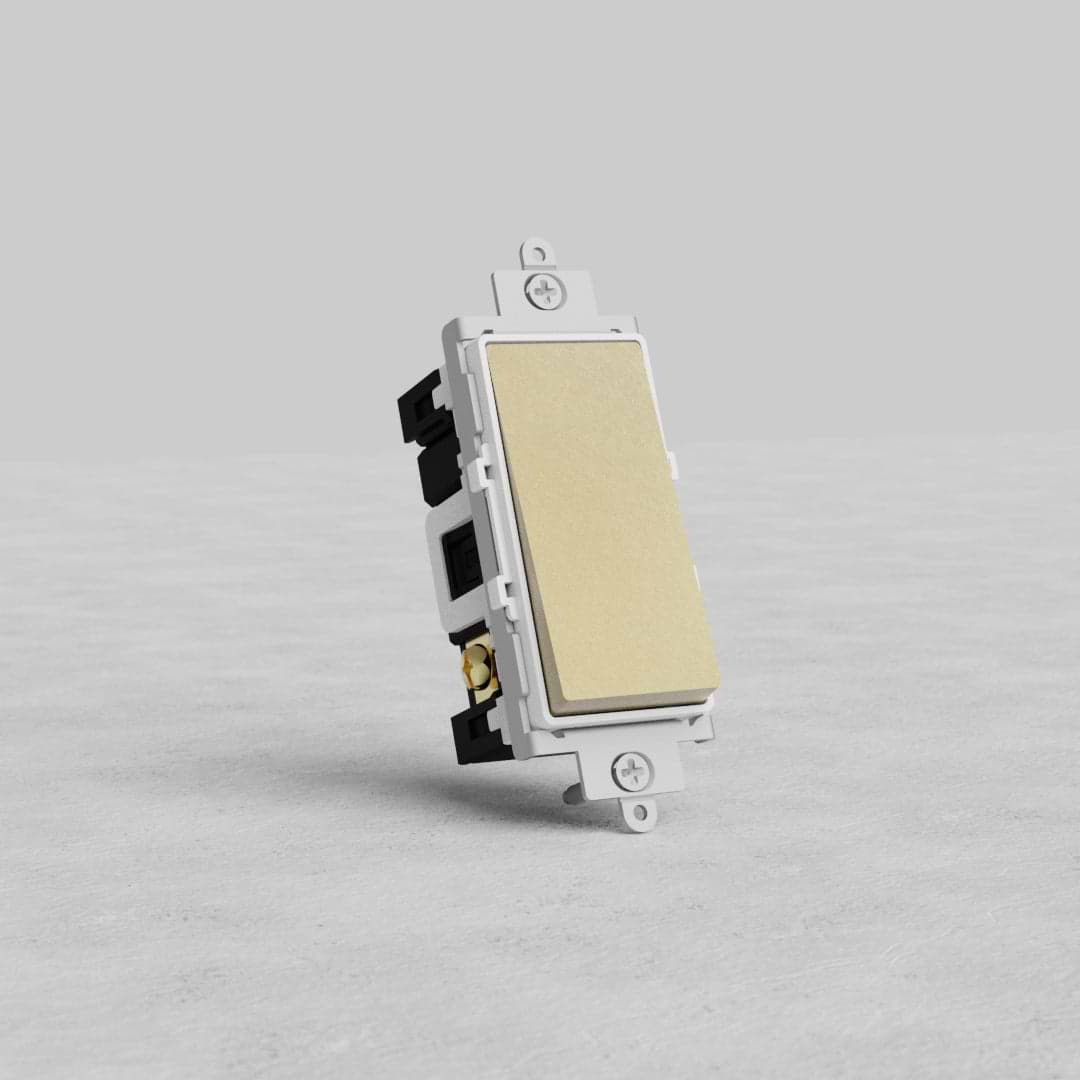 Double Pole Rocker Switch in Antique Brass with white insert, shown upright on a light gray textured surface.