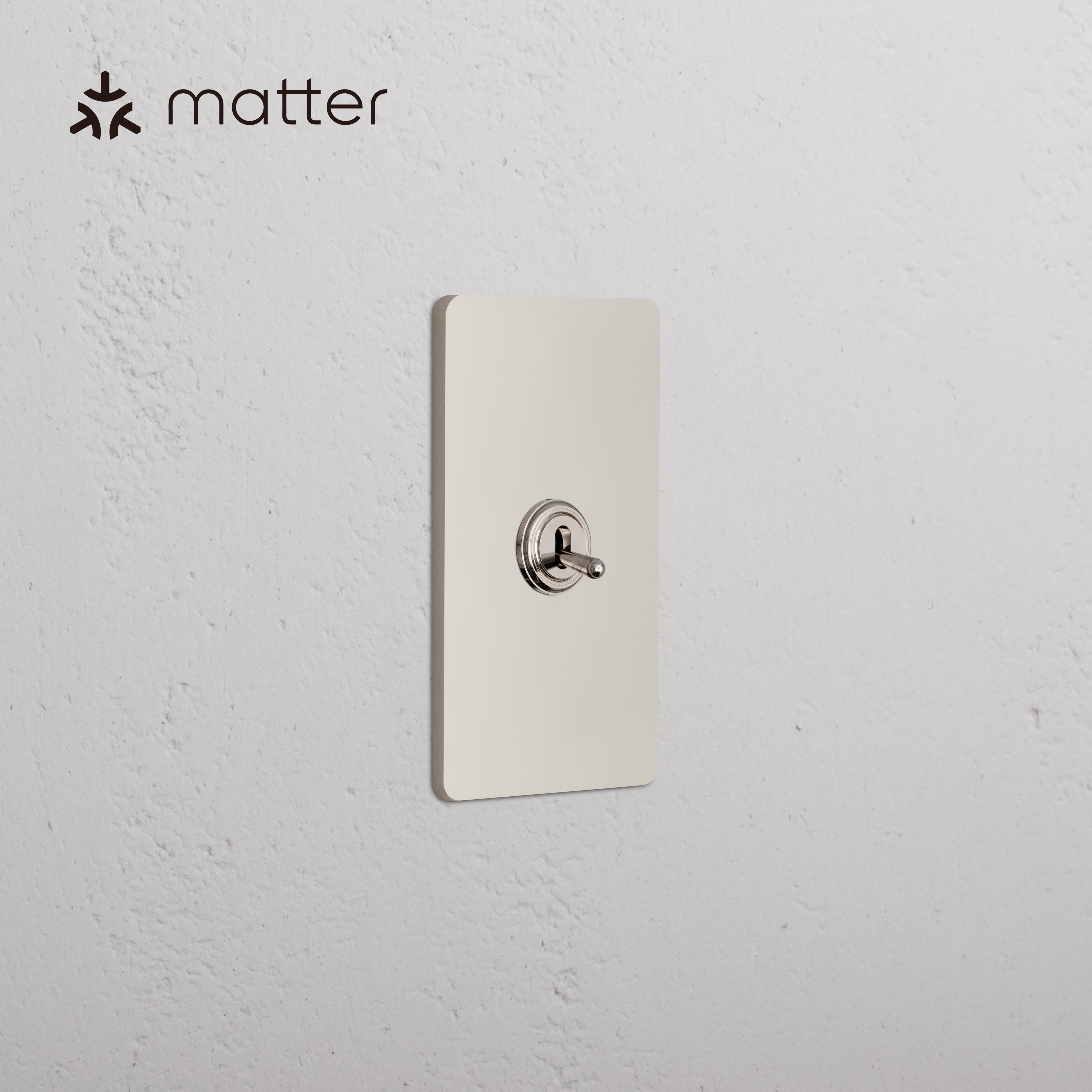 Grove 1G Smart Retractive Toggle Switch in Polished Nickel, single rectangular plate with toggle switch.