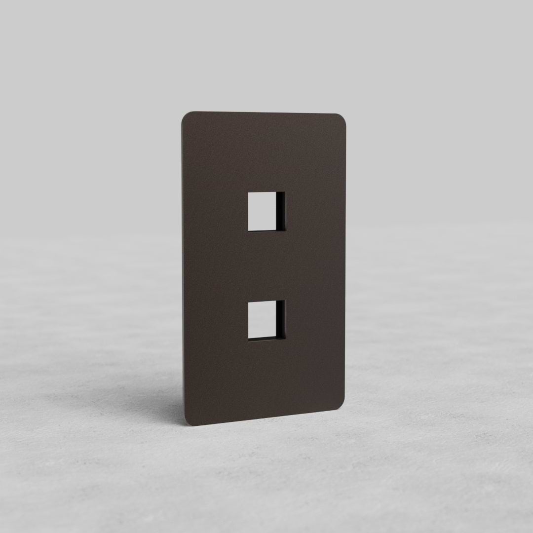 Bronze 1-gang 2-port keystone wall plate (Kew US) with two rectangular cutouts, shown upright.