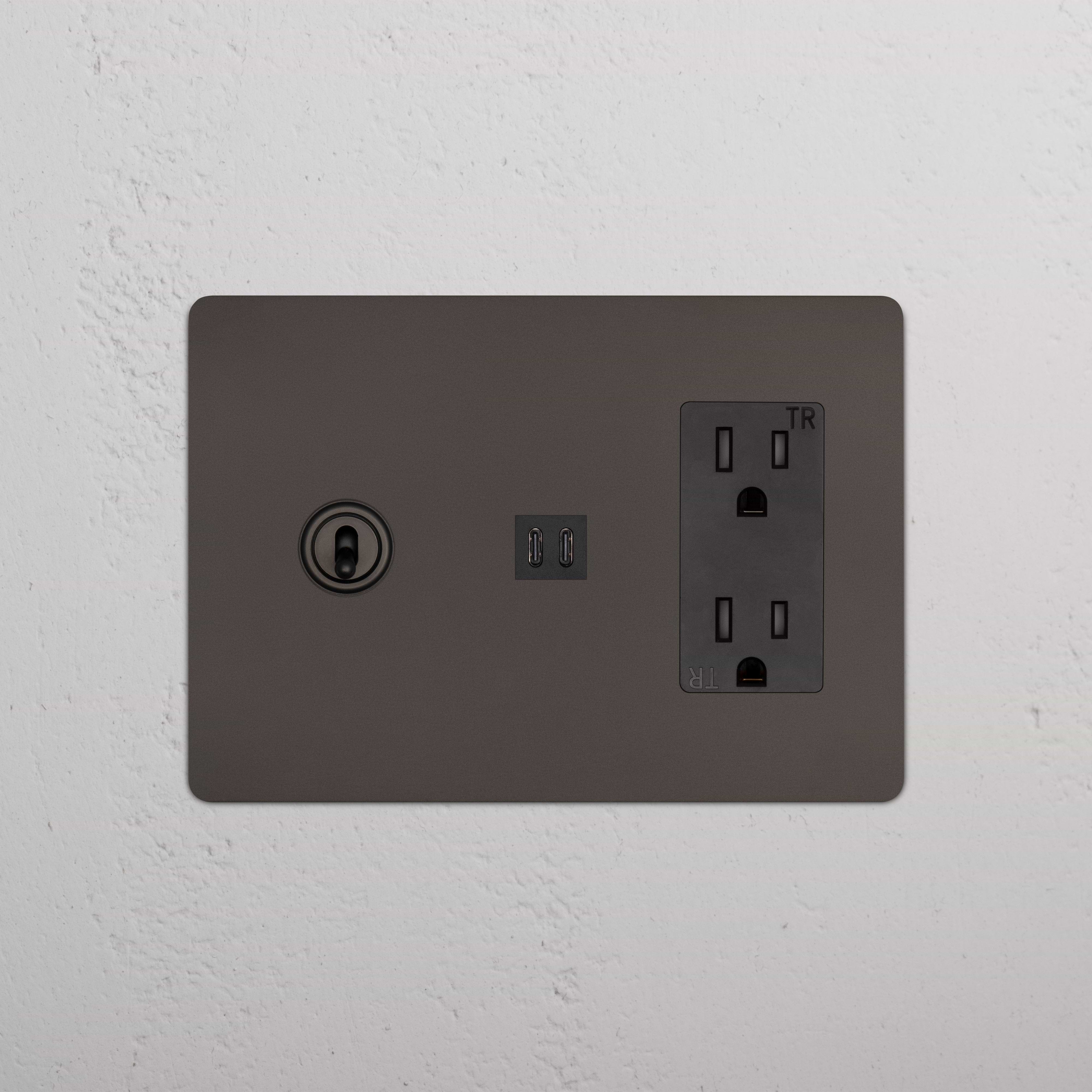 Bronze Black Kew 3G Toggle Switch with power outlet and fast charge USB ports on a wall plate.