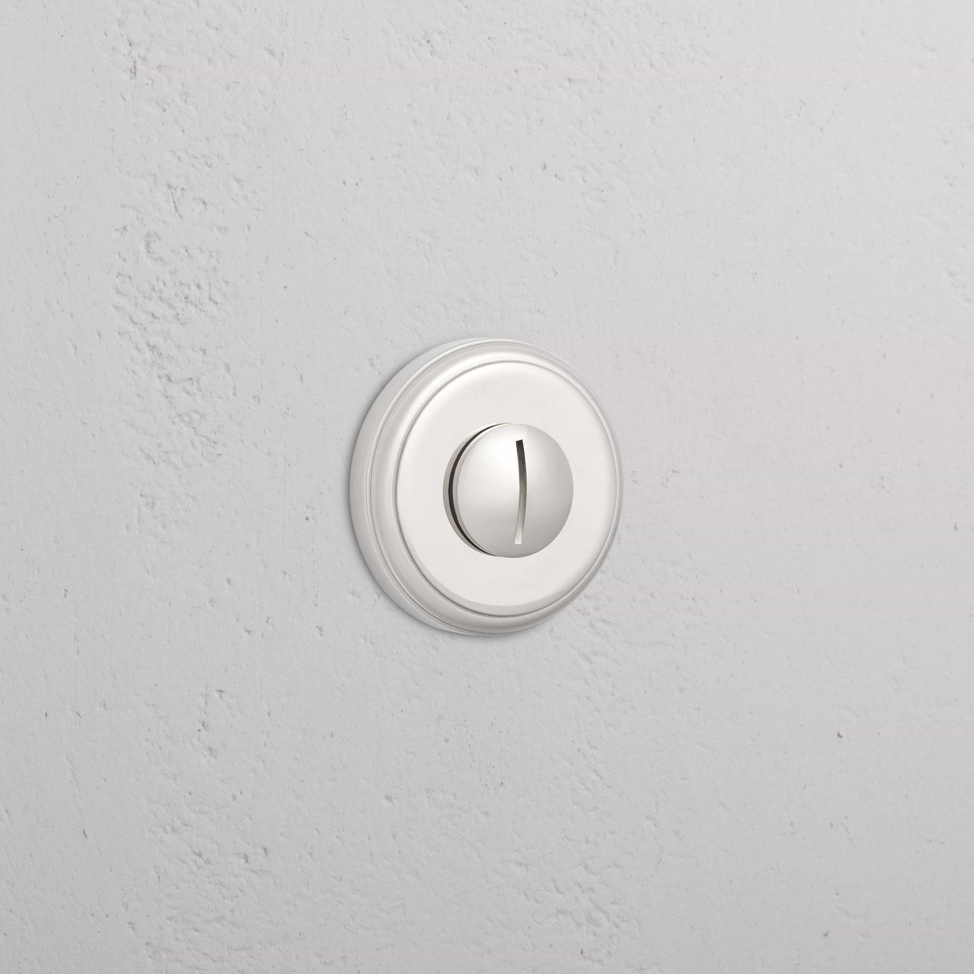Canning Privacy Deadbolt in Polished Nickel with a round turn piece and minimal, modern design.