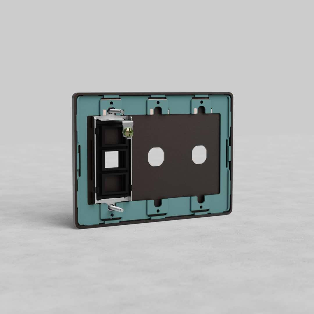 Bronze 3-gang wall plate with two switch openings and a keystone port, Grove US series, shown upright.