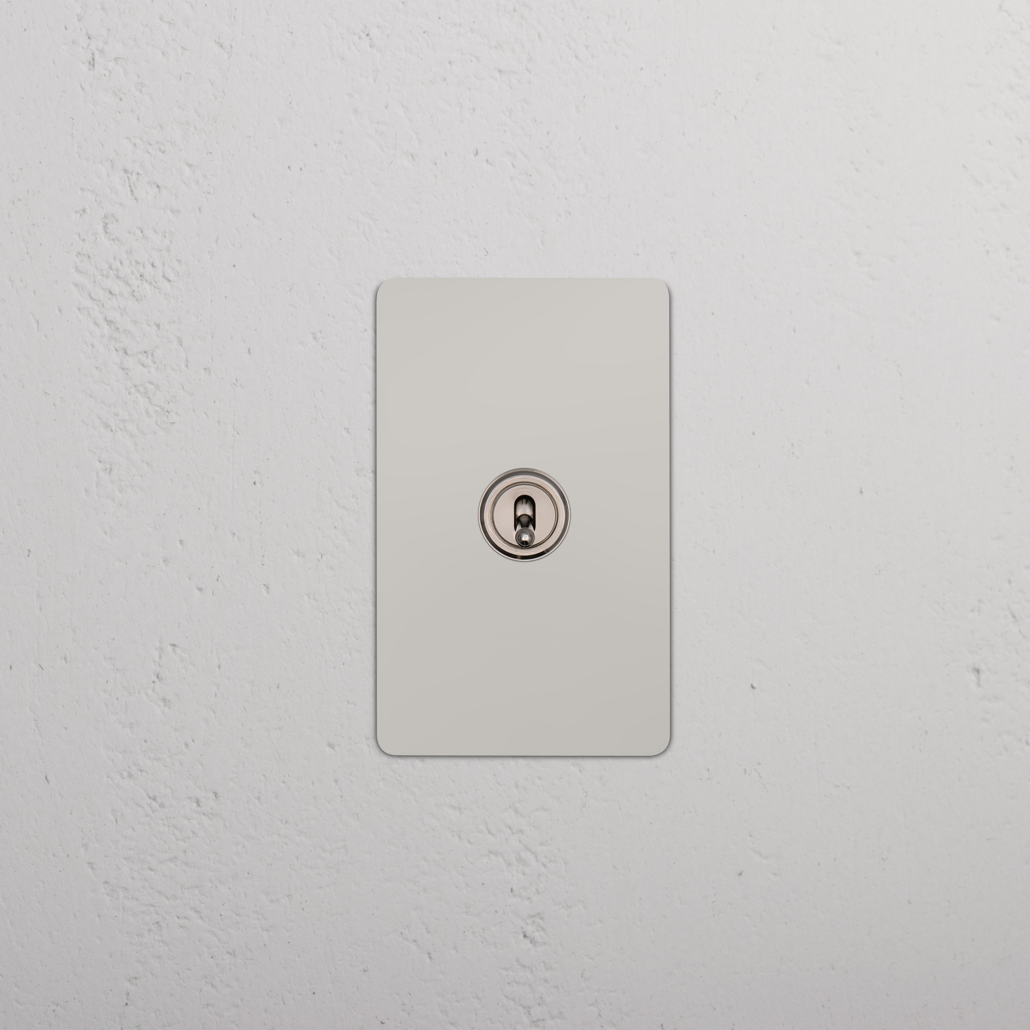 Kew 1G Four Way Toggle Switch in polished nickel, rectangular plate with four toggle switches.