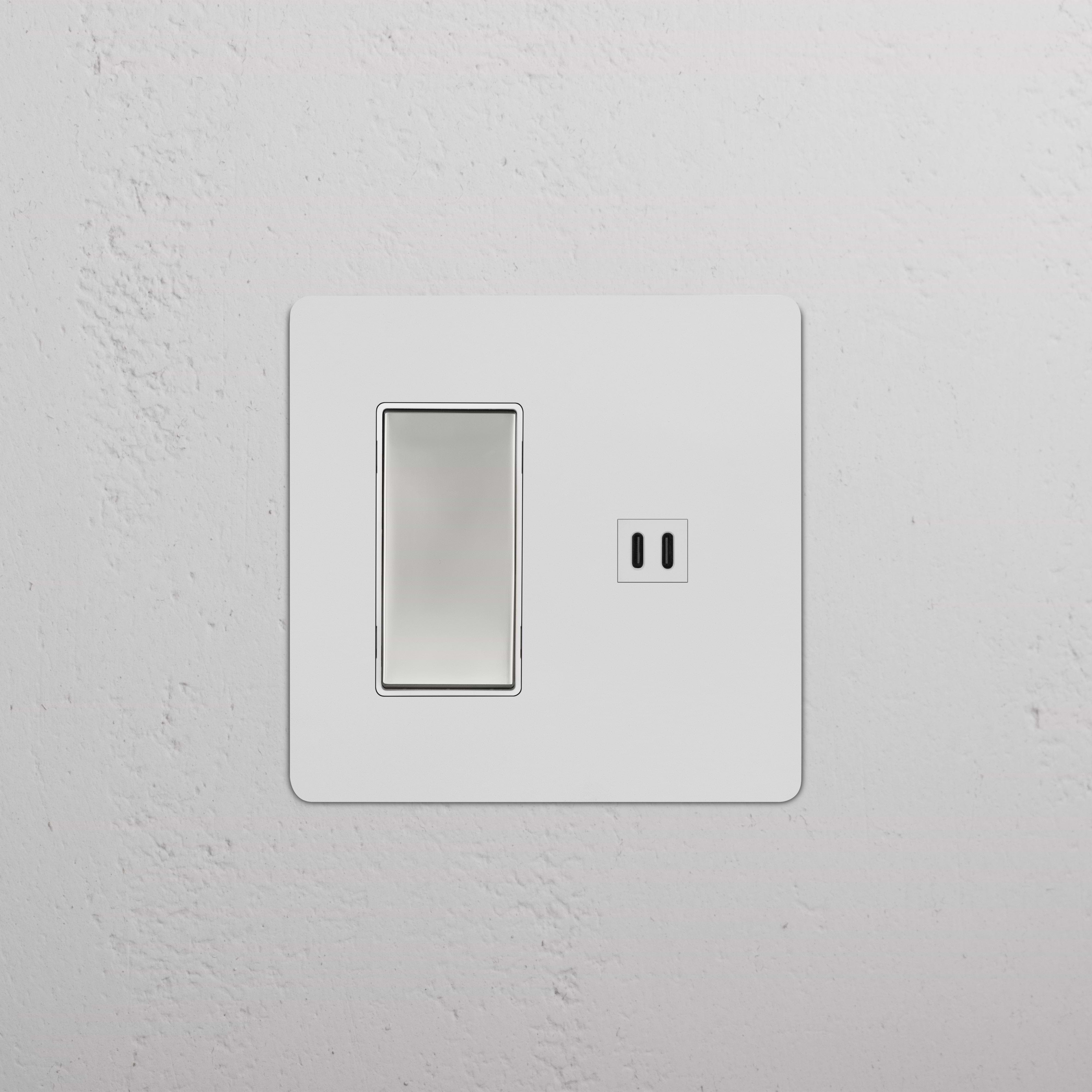 Kew 2G Rocker Switch & Fast Charge USB in paintable polished nickel white, mounted on a white wall.
