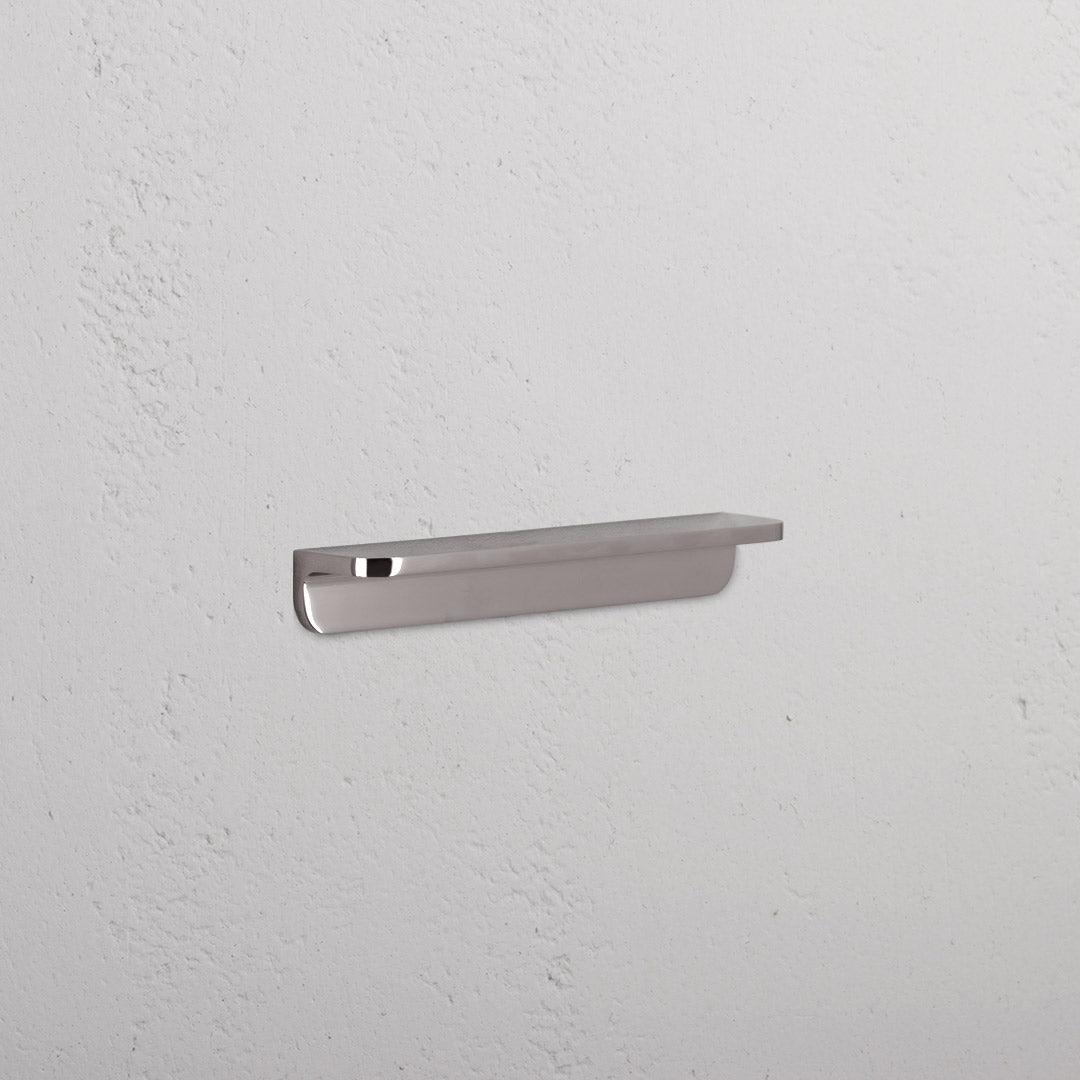 Polished nickel Oxford Furniture Handle Small, a sleek metal handle with classic detailing for cabinets or drawers.