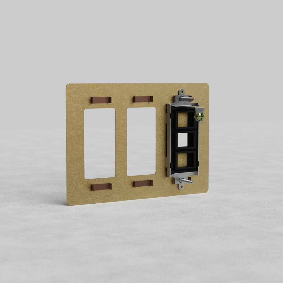 Rectangular antique brass 3G 2x outlet and keystone plate with two outlets and one keystone opening.