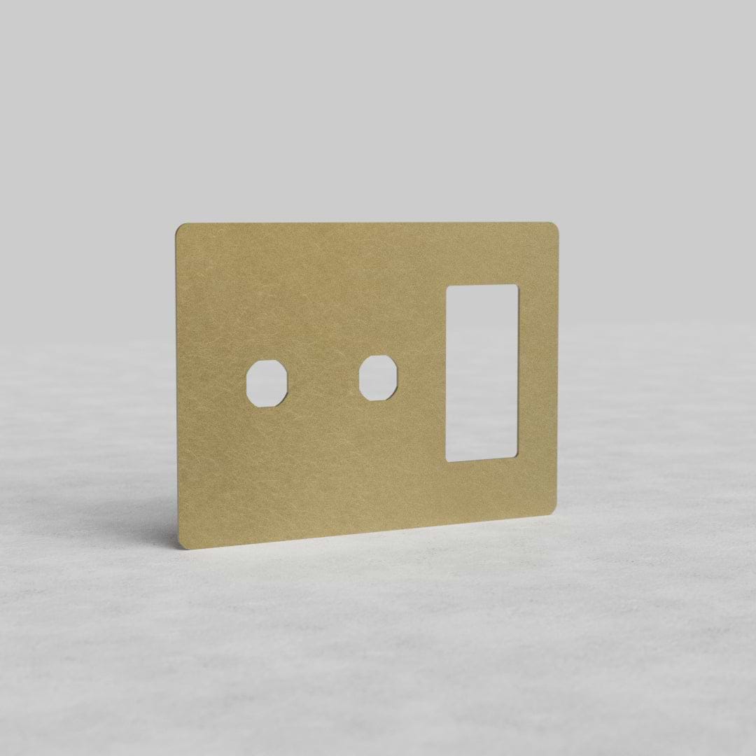 Antique brass 3G 2x switch and outlet plate Kew US with two switch cutouts and one outlet opening.