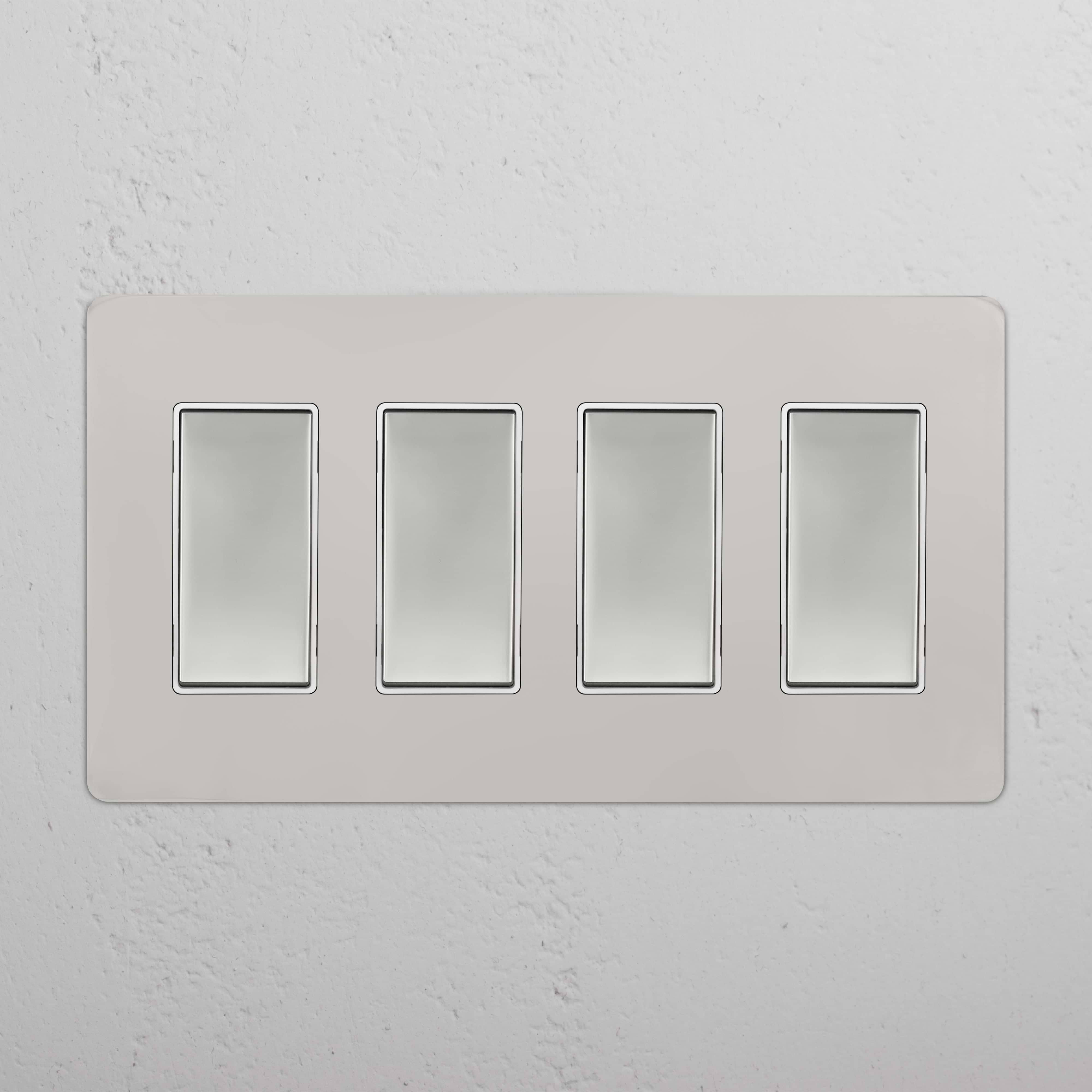 Kew 4G Rocker Switch in Polished Nickel White with four white rectangular switches on a wall plate.
