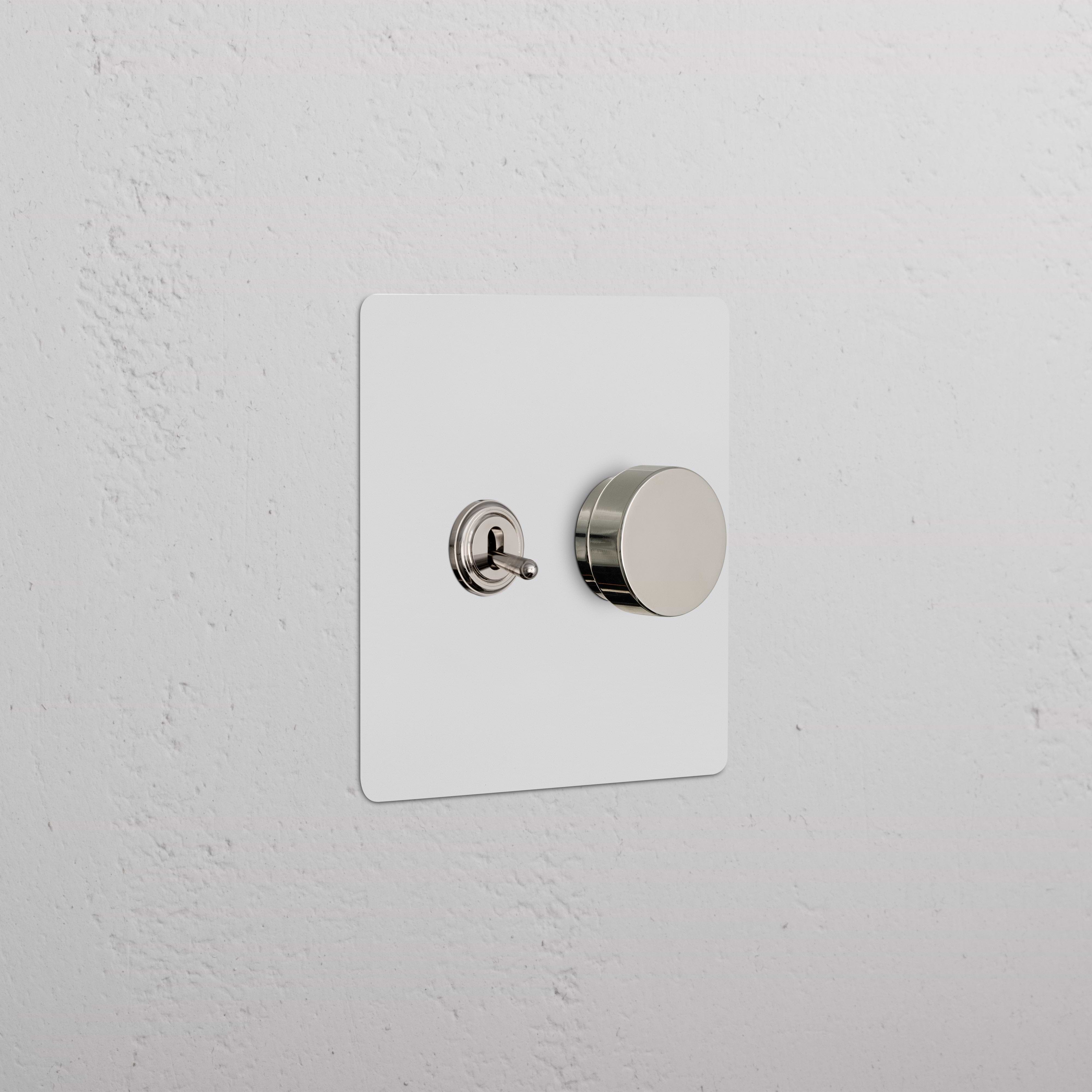 Kew 2G Toggle & Dimmer Switch in paintable polished nickel with toggle and round dimmer knob on plate.