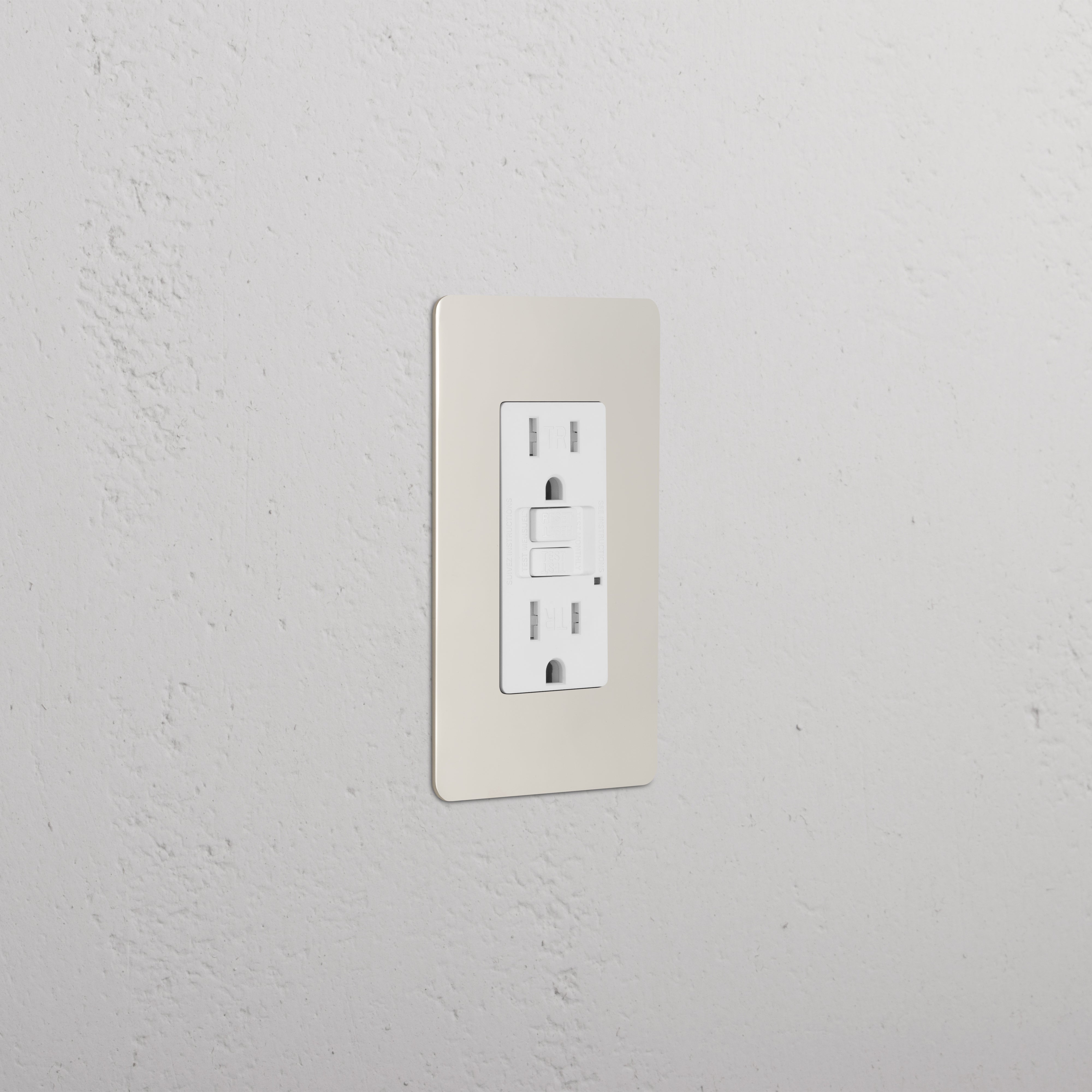 Kew 1G 15A GFCI Outlet in Polished Nickel White with two sockets and test/reset buttons on a wall.
