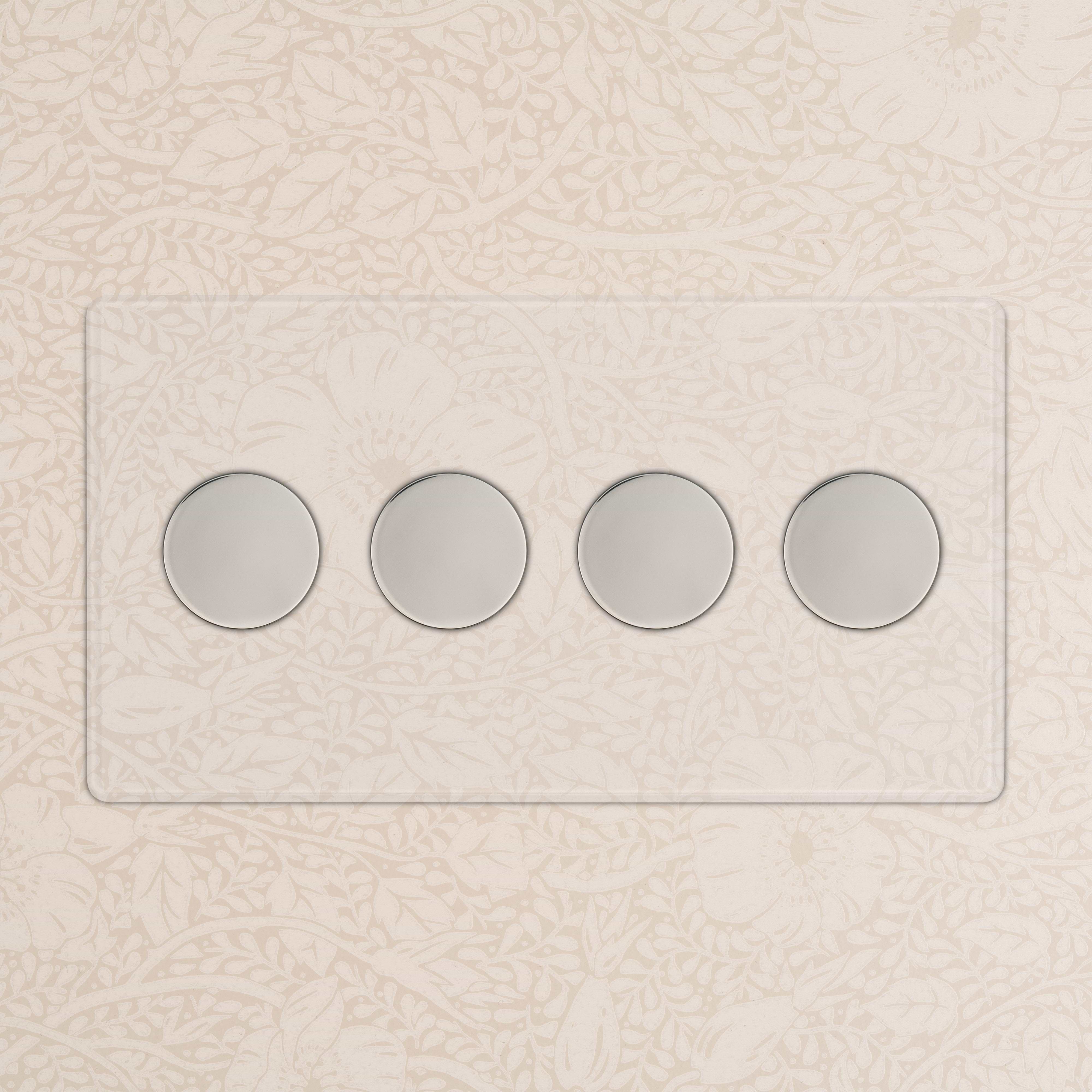 Kew 4G Dimmer Switch - Clear Polished Nickel with four round knobs on a wall with floral cream wallpaper.