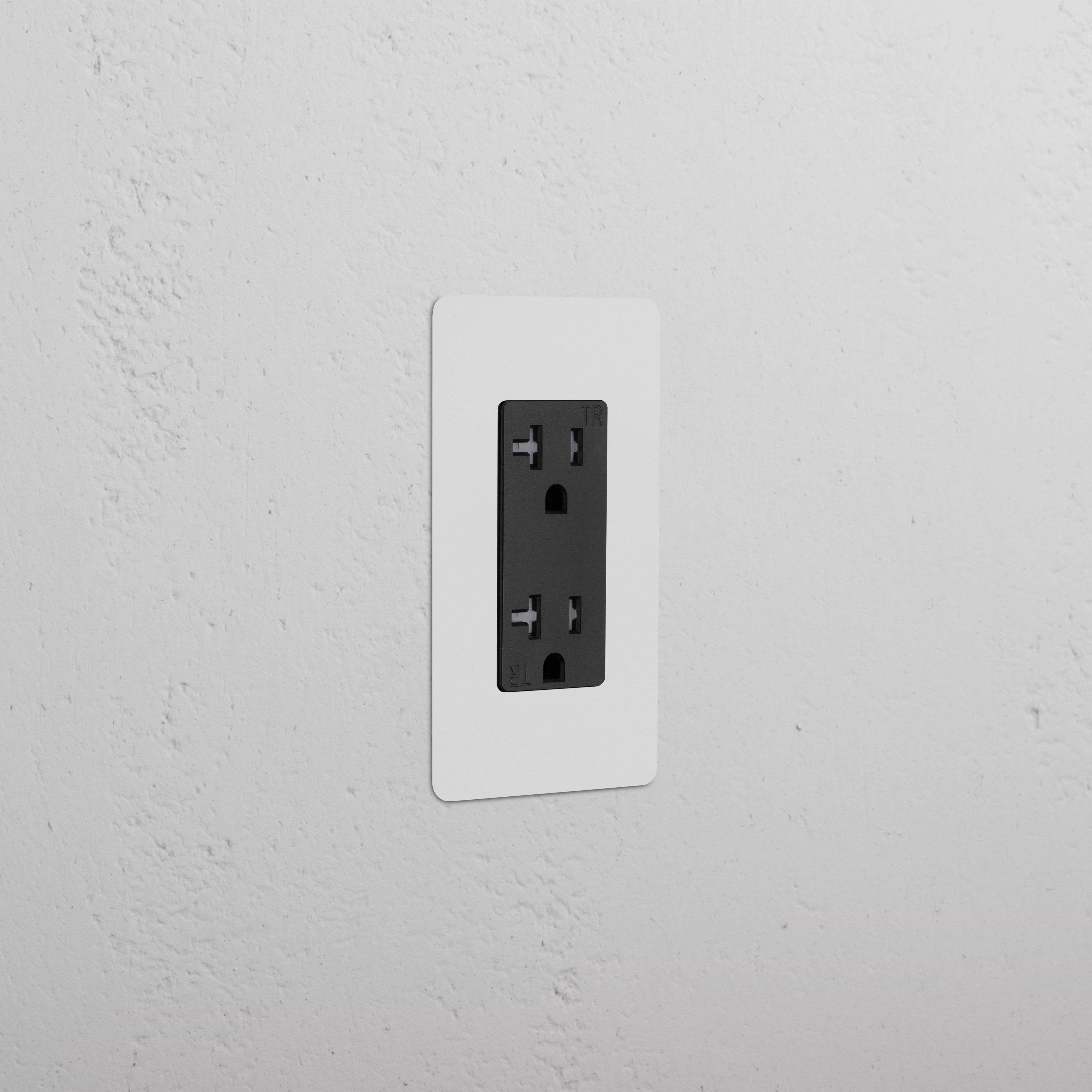Kew 1G 20A Outlet in paintable black with a single outlet on a sleek, rectangular faceplate.