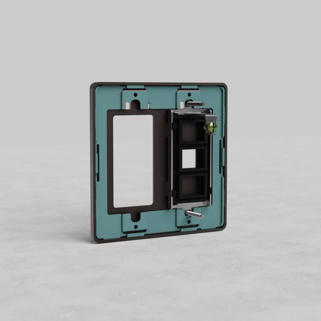 Bronze 2G Outlet & Keystone Plate Grove US wall plate with mounting bracket and screws on gray surface.